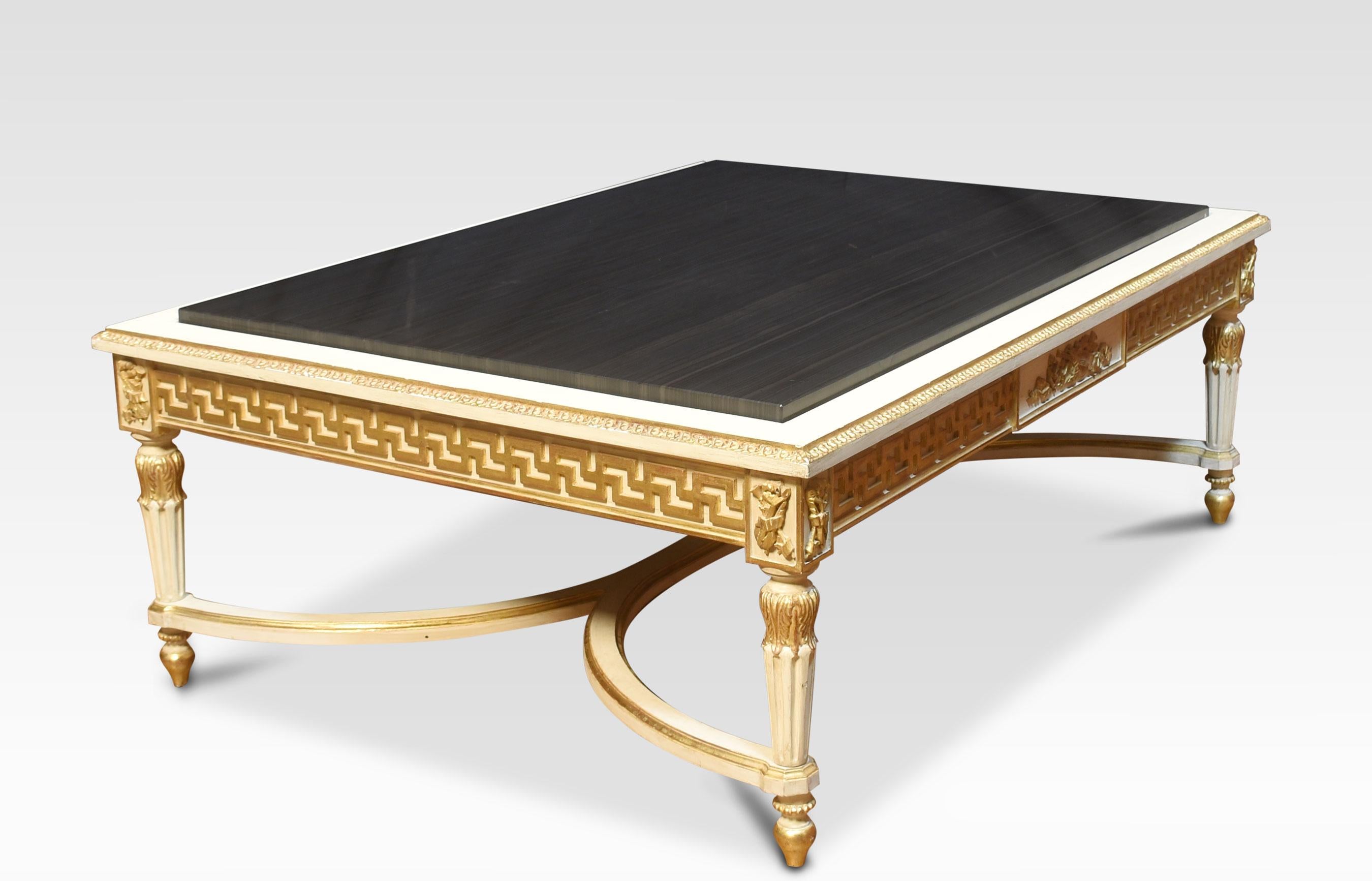 Venetian style coffee table, the large rectangular black veined marble top above cream and gilt painted base. All raised up on turned reeded tapering legs, united by curved stretchers.
Dimensions
Height 19 Inches
Width 53 Inches
Depth 39.5 Inches