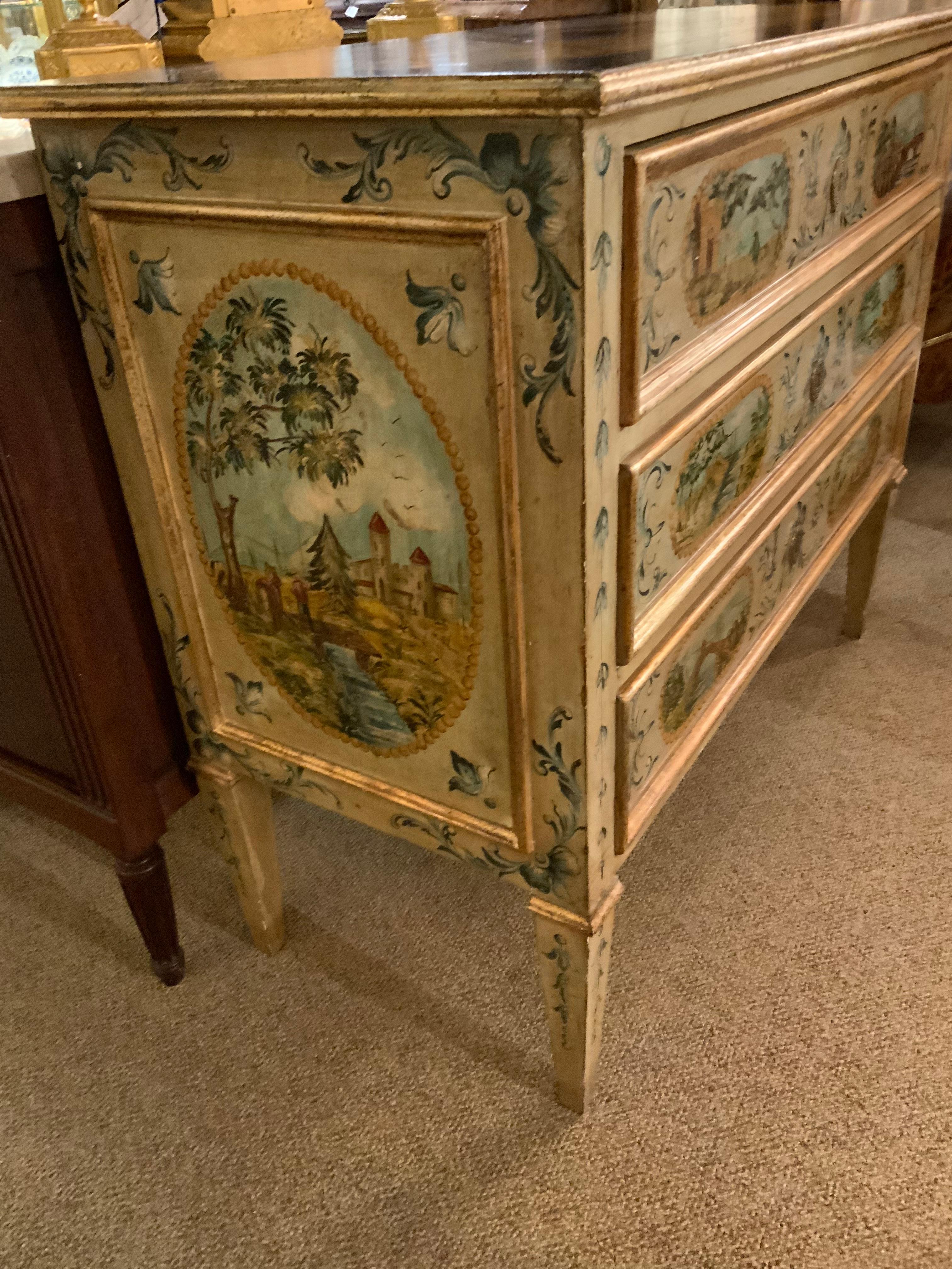 This piece is Venetian and is hand painted throughout 
With painted flowers, vines, genre scenes and faux
Marble, the case fitted with three drawers with molded
Perimeter edges and tapering legs. The case hue is a
Pale creamy yellow and the