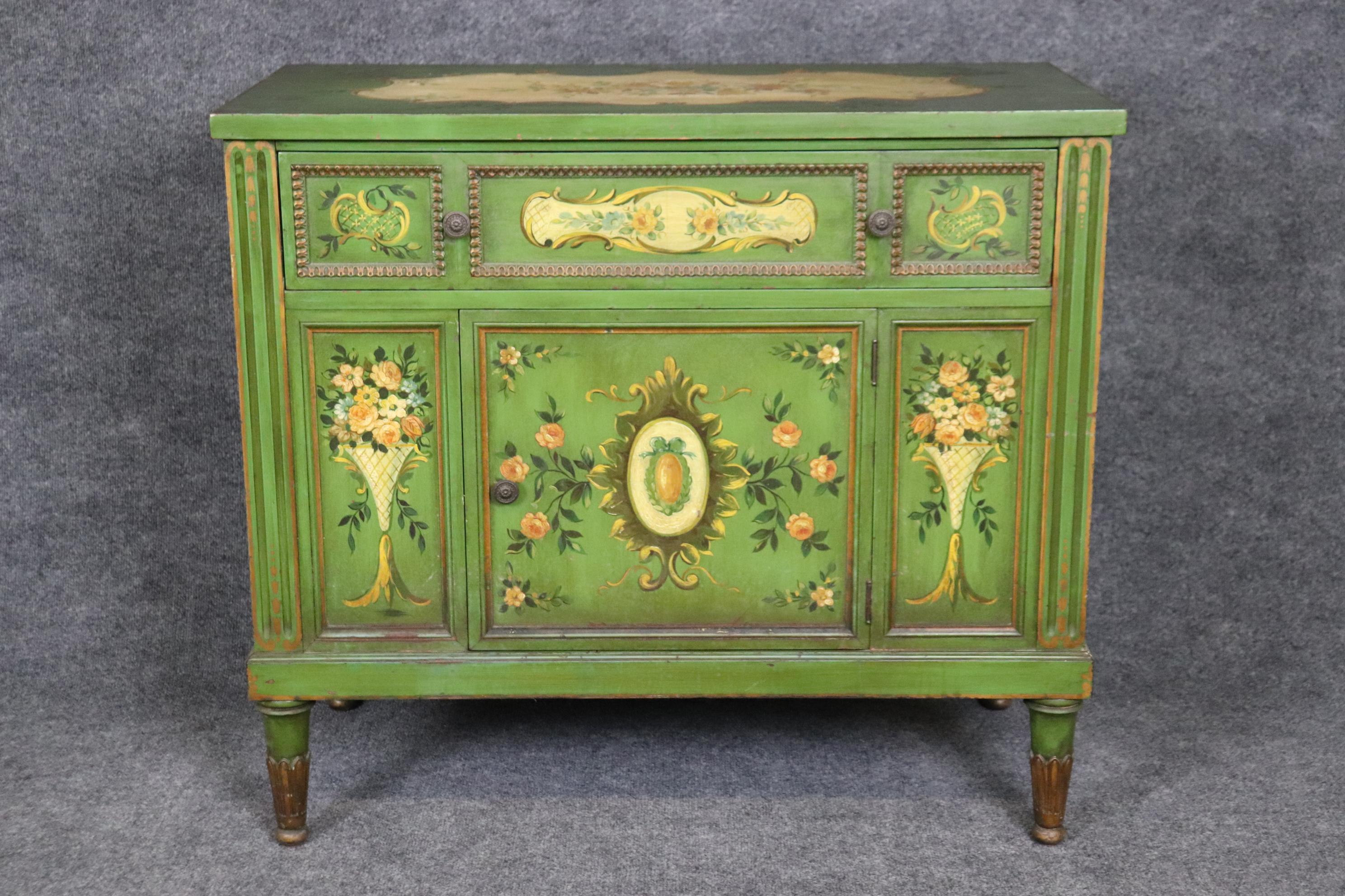 Dimensions: Height: 32 1/4in Width: 36in Depth: 18in

This vintage Venetian style green paint decorated commode/cabinet is made of the highest quality and is done very nicely! If you look at the photos provided, you will see the intricate detail in