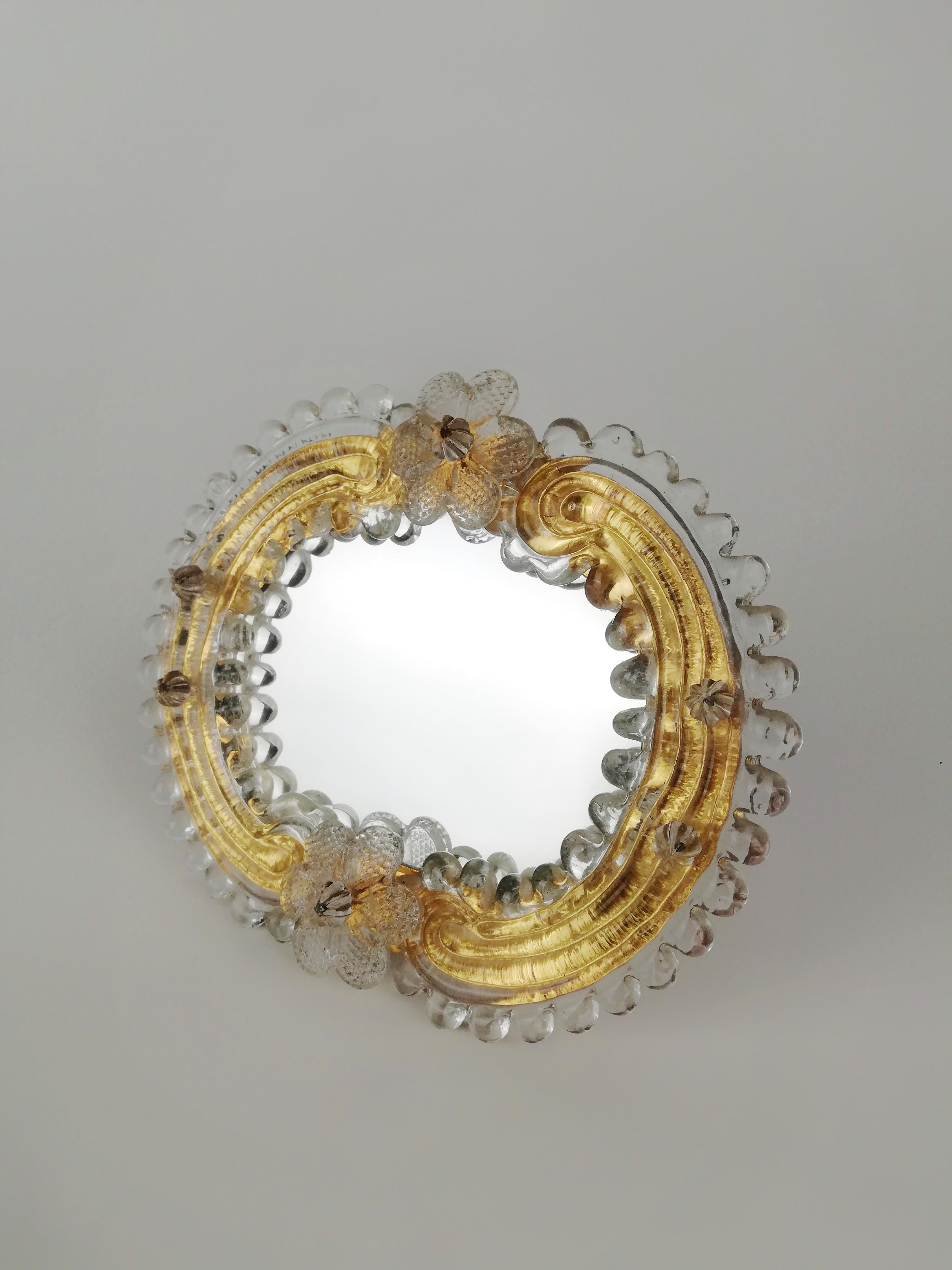 Little table mirror produced during the Mid Century in the typical venetian style by 
 the Murano's company 