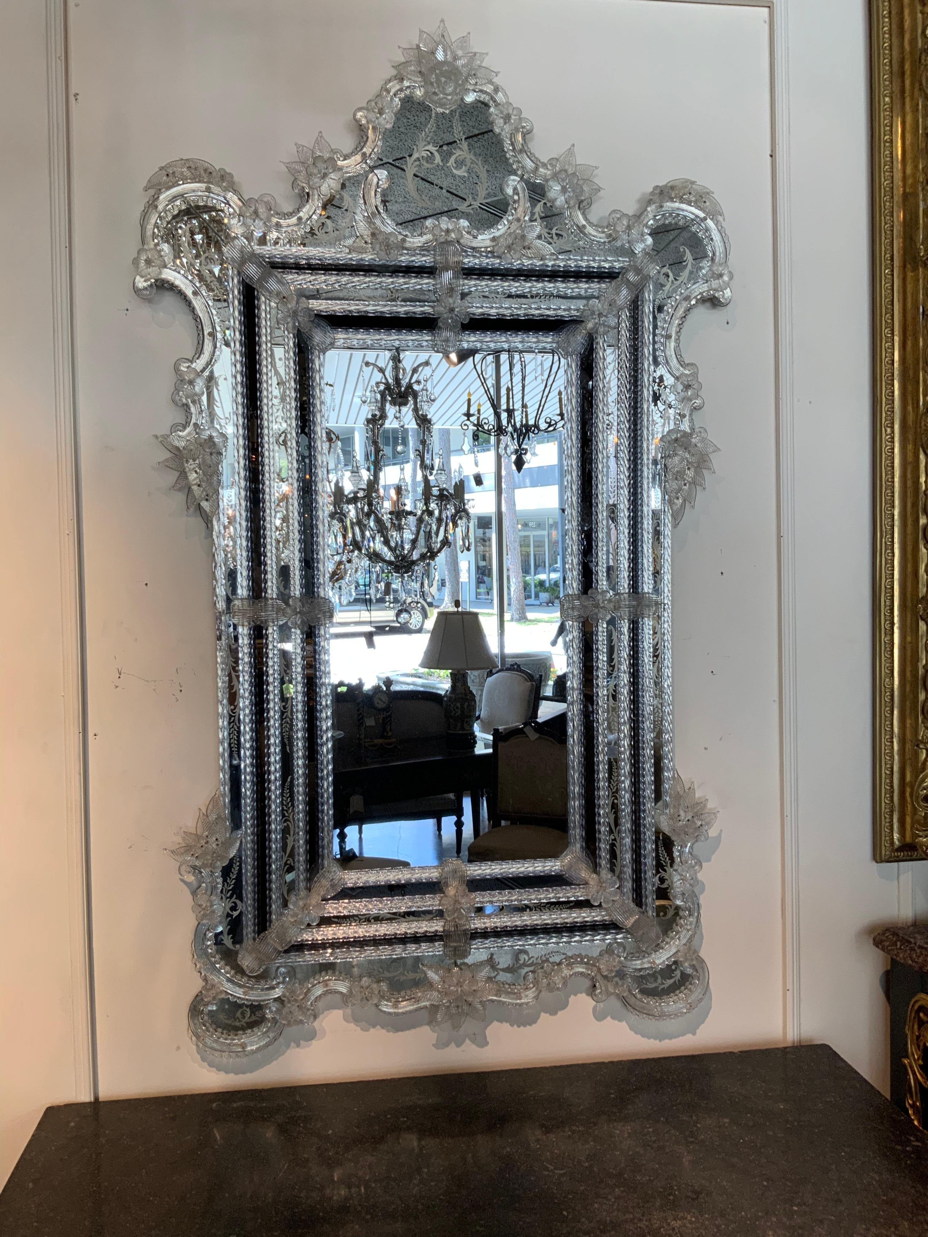 This mirror is large and the glass is all very clear without
Age spots. The flowers are all in great condition without
Chips or breaks. The scrolling glass is very graceful with
Exquisite lines.