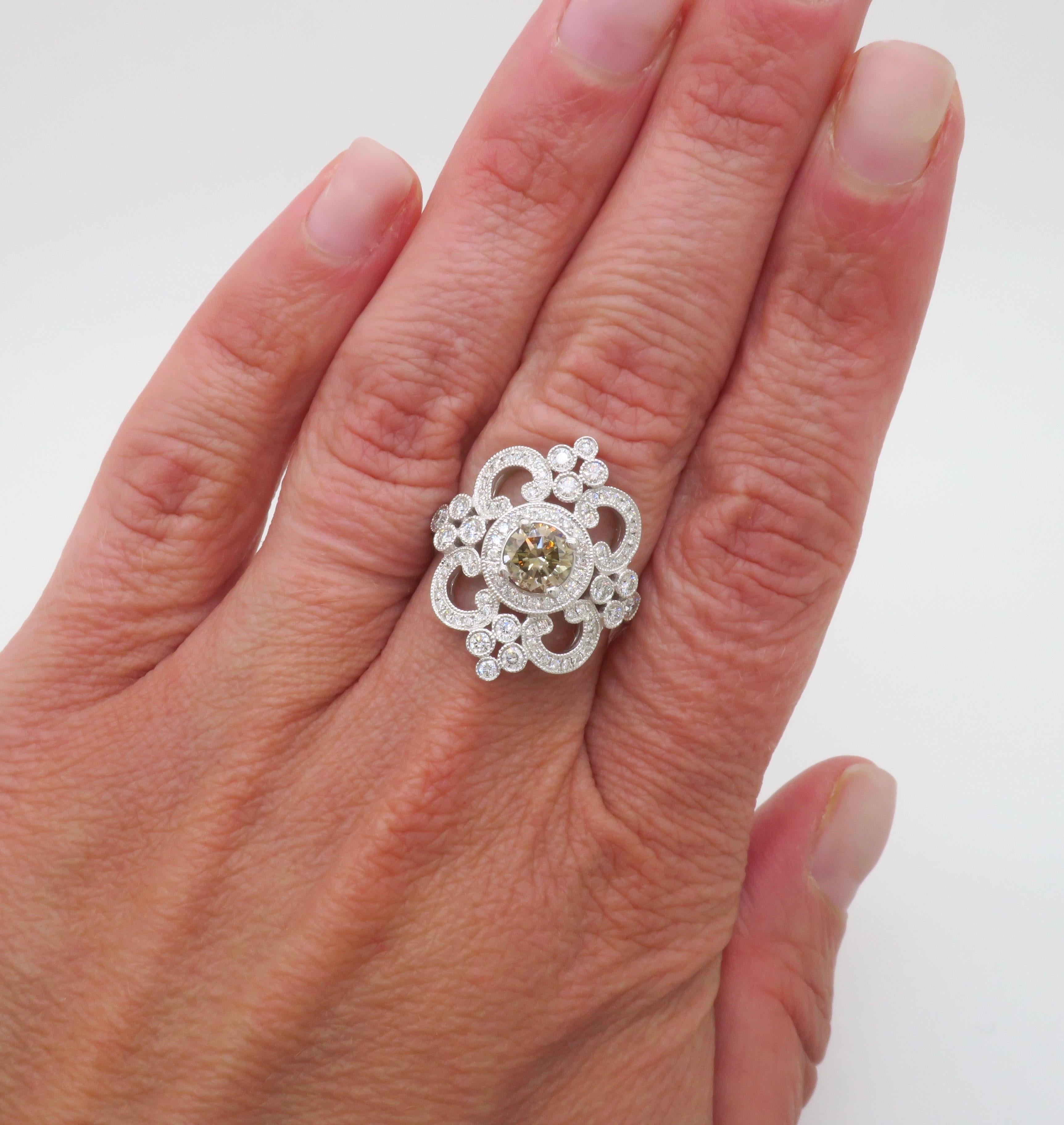 Designer Venetti 1.78CTW Vintage inspired diamond ring made in 14k white gold. 

Center Diamond Carat Weight: .76CT 
Center Diamond Cut: Round Brilliant Cut 
Center Diamond Color: Light Chocolate 
Center Diamond Clarity: I1
Total Diamond Carat