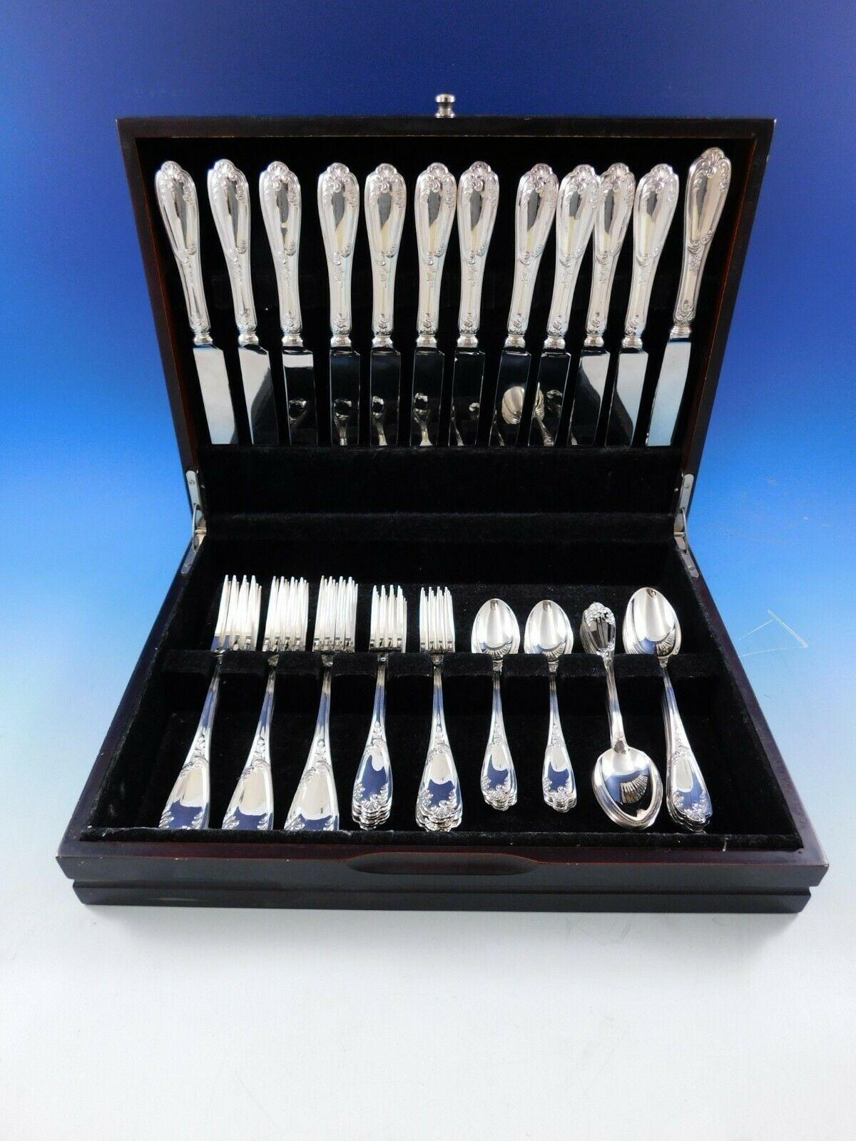 Unused continental size Venezia by Fortunoff Italy sterling silver flatware set, 60 pieces. This set includes:

12 continental size knives, 9 7/8