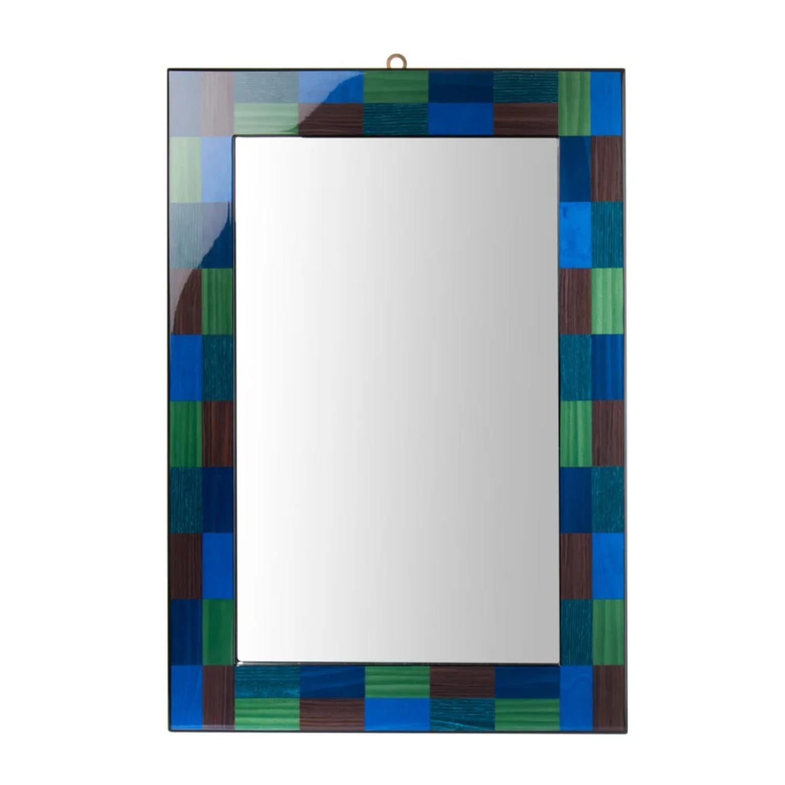 Venezia Cannaregio Mirror by Morici
Dimensions: W 57 x H 81 cm
Materials: Wood, inlay veneer.
Finish : Gloss brushed polyester.

About:
Driven by a passion for craftsmanship, Luciano Morici and his wife Doriana Marconi launched their business in the