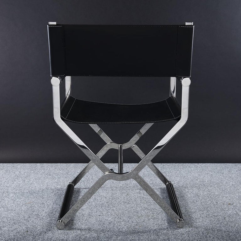 Featuring a design by Nuova Benyacht, the Venezia chair is the epitome of perfect harmony between the round and squared lines of the stainless steel structure and the luxurious black made in Italy leather of the seat. This stylish and sophisticated