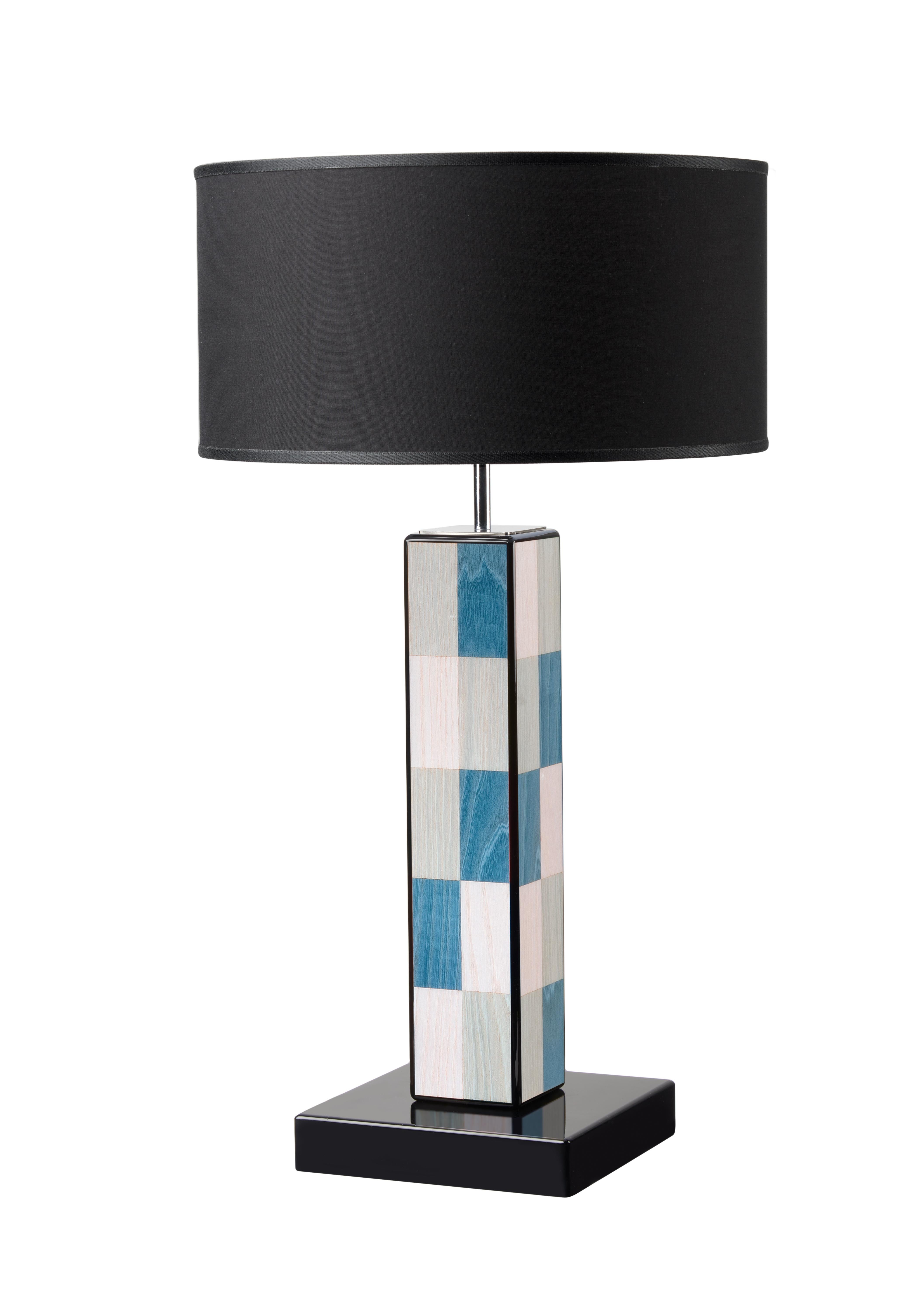Part of the Venezia Laguna series of designs inspired by the namesake historic sestiere of Venice, this table lamp will make for a timeless addition to a contemporary-style interior. Boasting a handmade inlay work painted by hand in a vivacious,