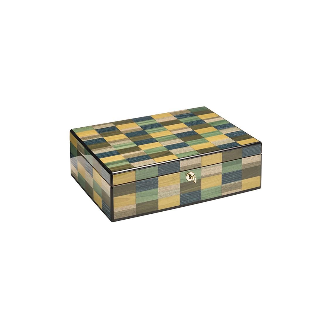 A splendid piece of functional decor fit for a private office or studio, this pen case is distinguished by an exquisite handmade inlay work of a series of colorful rectangles of modern inspiration. Enriched with gold-finished metal details, it is