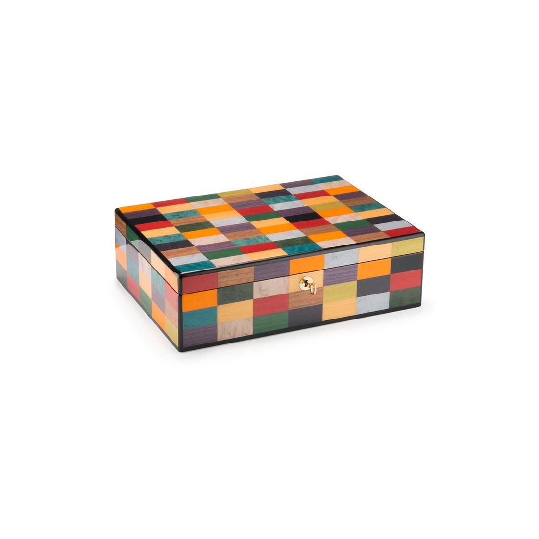 A splendid piece of functional decor fit for a private office or studio, this watch case is distinguished by an exquisite handmade inlay work of a series of colorful rectangles of modern inspiration. Enriched with gold-finished metal details, it is