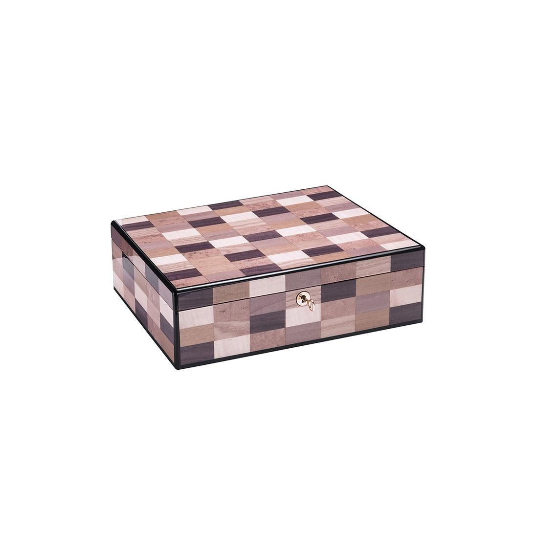 A stylish and practical design suited for safekeeping cherished items, this rectangular box will add an accent of sophistication to a vanity desk, console or nightstand. Masterfully handcrafted of mahogany wood, it is lined with beige Alcantara and