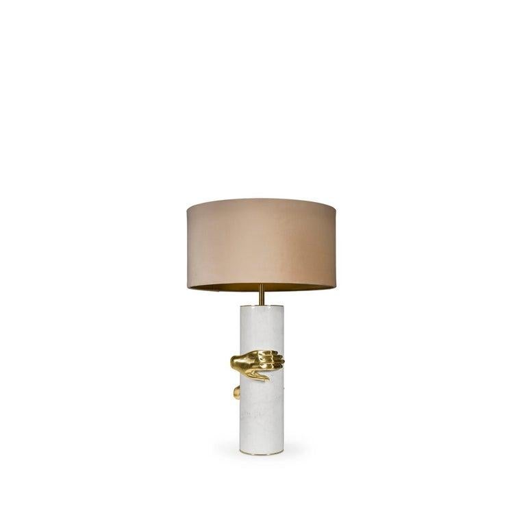 Seeking retribution, she fights to take back what is rightfully hers. Cast brass hands grasp the Vengeance lamp's marble column structure embodying her impassioned struggle.

Materials & Finishes: 
Base: Polished Brass (High Gloss Finish)
Body: