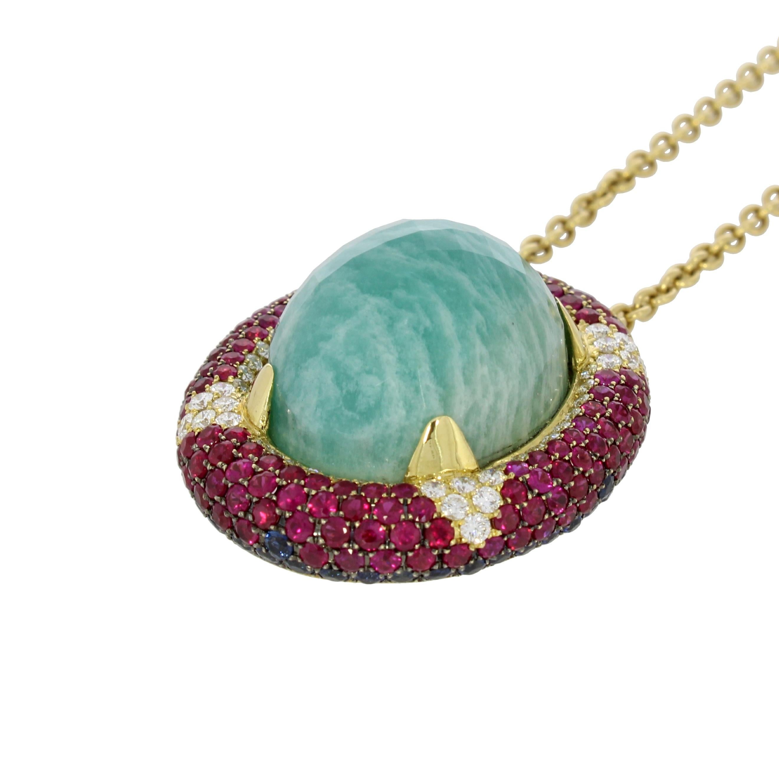 Reminiscent of the colourful Carnival of Venice, this striking composition features a plunging amazonite pendent surrounded by a geometric pattern of rubellite, amethyst and brilliant cut diamonds.

Venice Bauta Large Amazonite Ring
Details
- 18