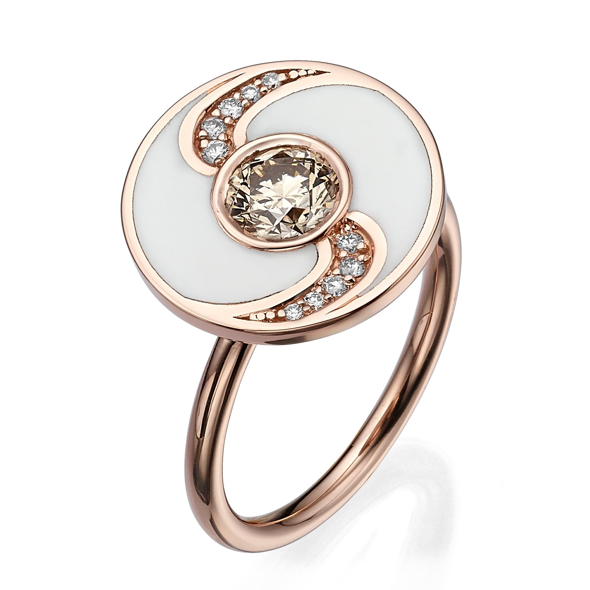 SKU# 4006106

A round shaped white enamel ring that exudes elegance and sophistication. The ring features a center Fancy Orangy Brown round SI1 diamond that weighs 0.73ct and is complemented by 10 additional diamonds that have a total weight of