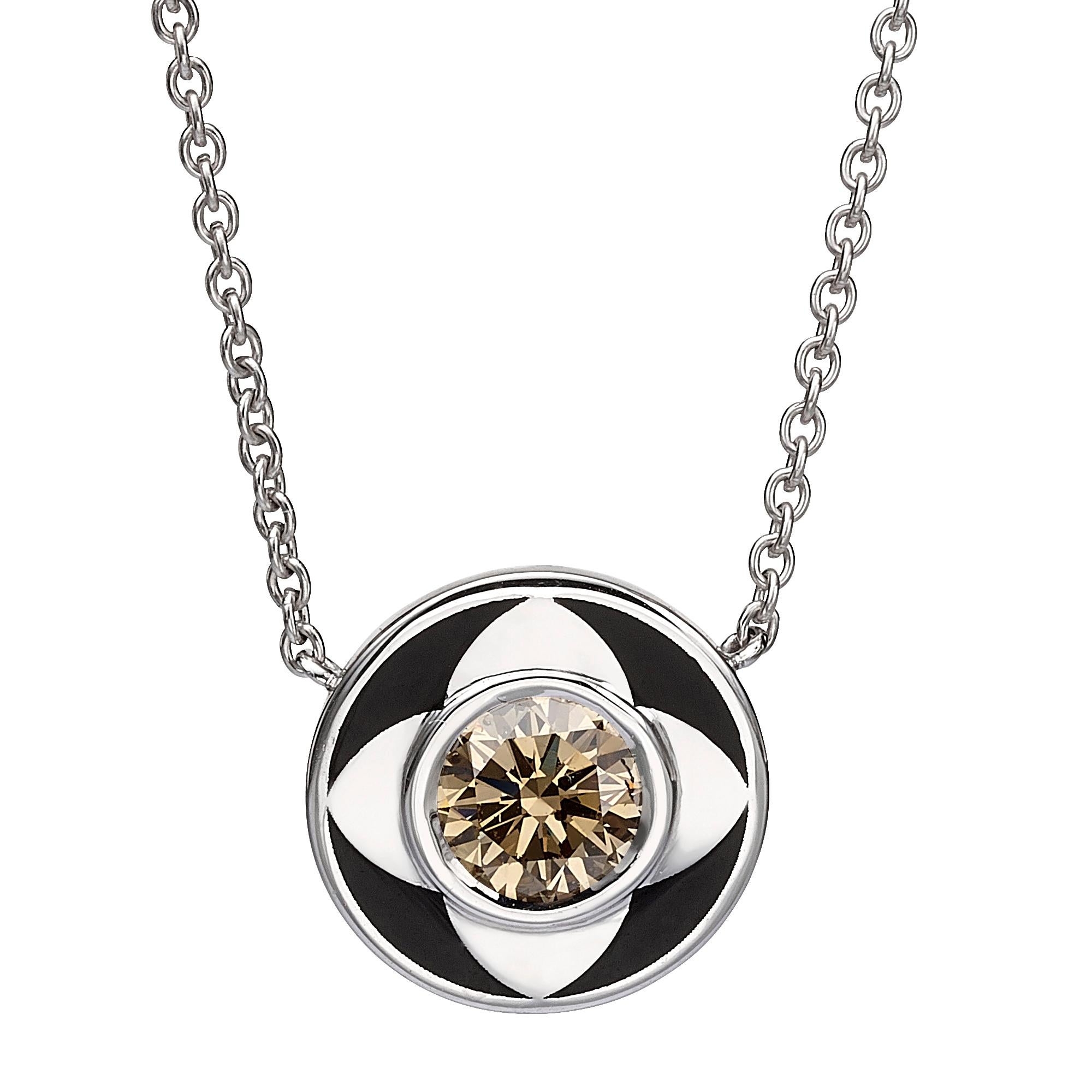 SKU# 4006118

A Round Shaped Black Enamel Diamond Pendant with a center round diamond 1.01 carat Fancy Orangy Brown.The pendant is made of 18 karat white gold, which is known for its durability and luxurious appearance. The gold is designed in a