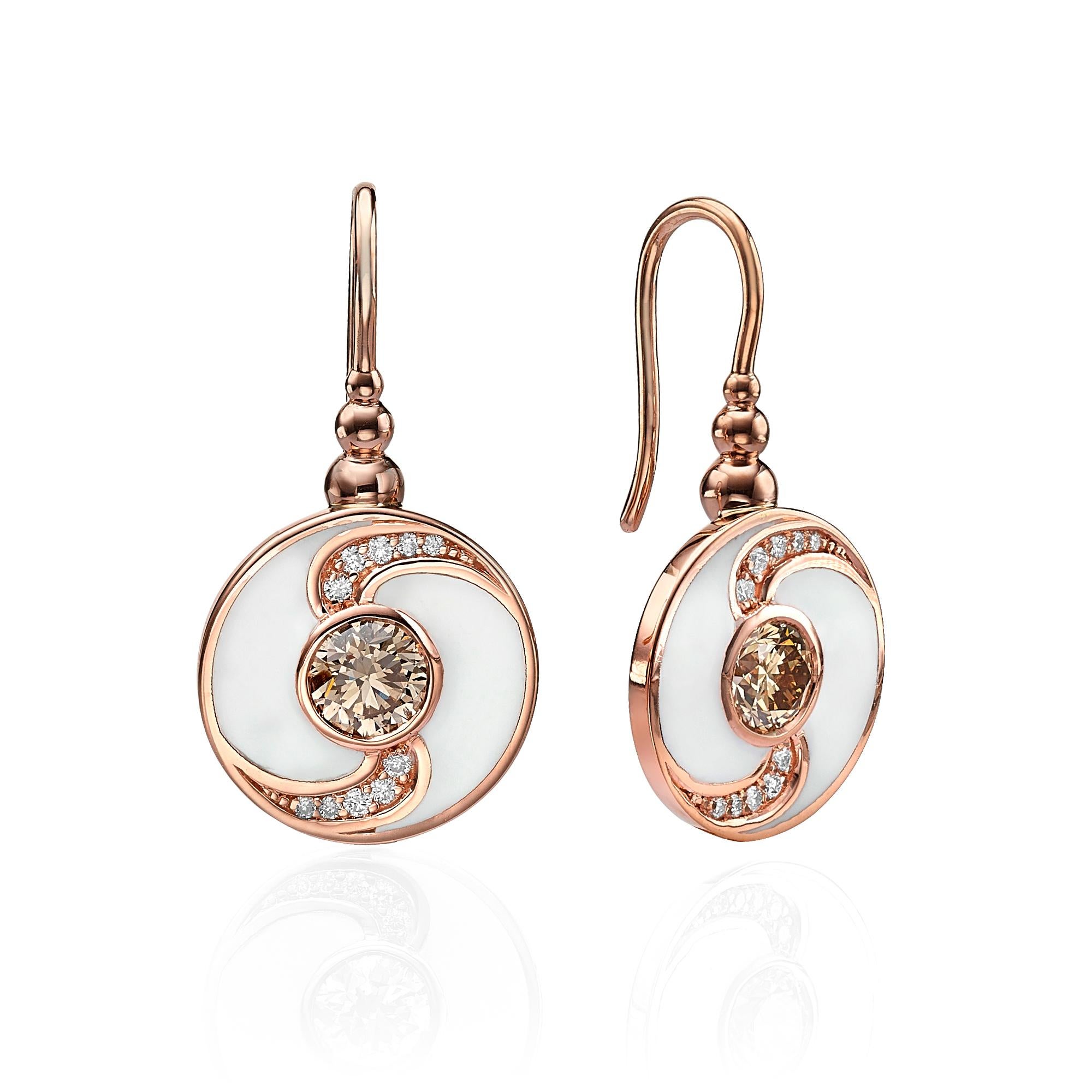 SKU# 4006110

Drop round-shaped earrings crafted with 18k rose gold. The earrings feature two central round fancy orangy brown diamonds with a total weight of 1.43 carats, creating a striking focal point and adding a warm and luxurious touch to