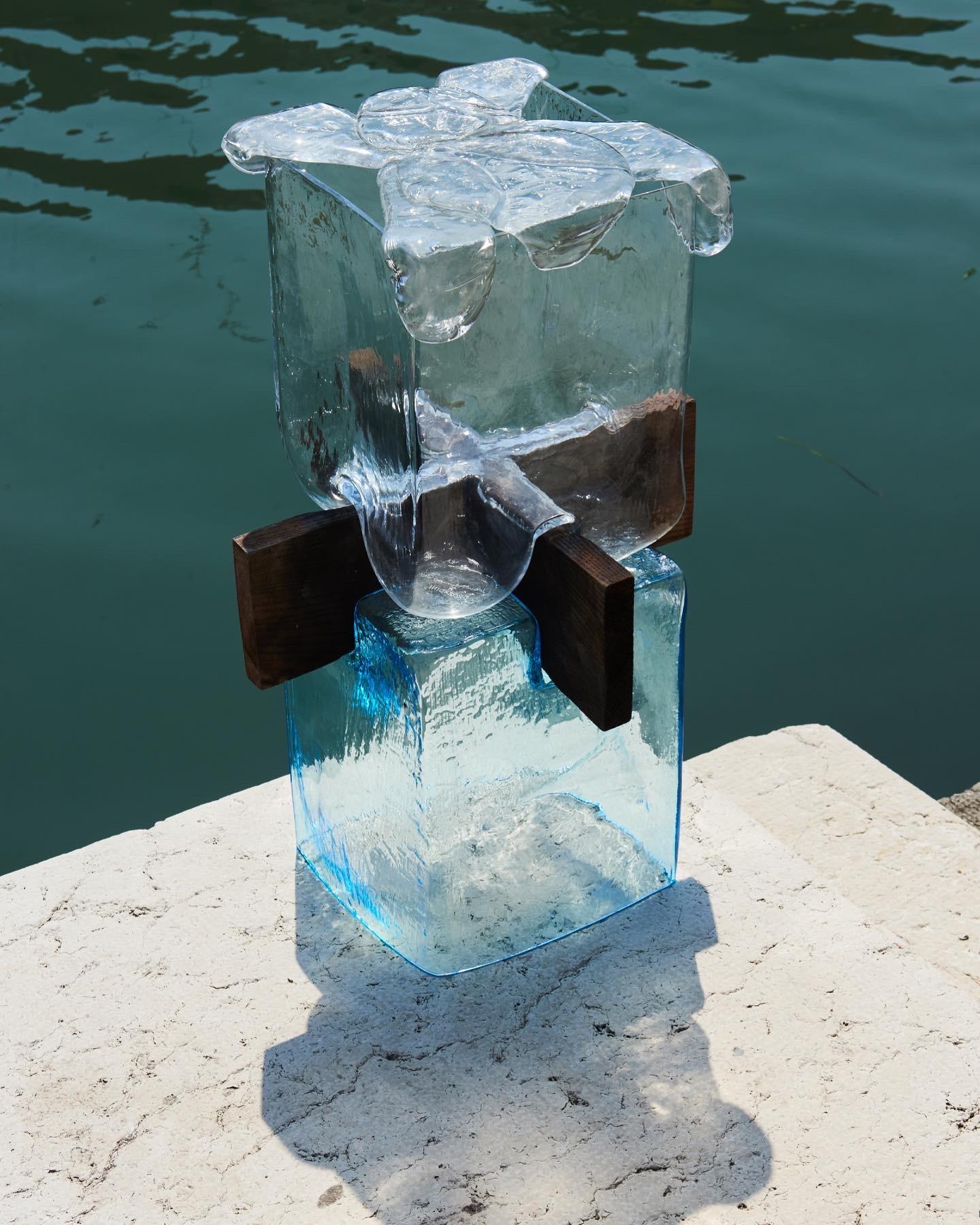 Venice Collection vase by Alexey Drozhdin
Dimensions: D 25 x W 25 x H 72 cm. 
Materials: glass, oak shape.

A young designer and artist Alexey Drozhdin creates extraordinary decorative glass objects. the designer became a finalist of the