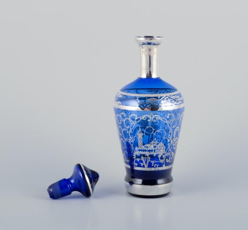 Italian Venice, Italy. Liqueur set in blue glass: decanter and five cups. Mid-20th C.
