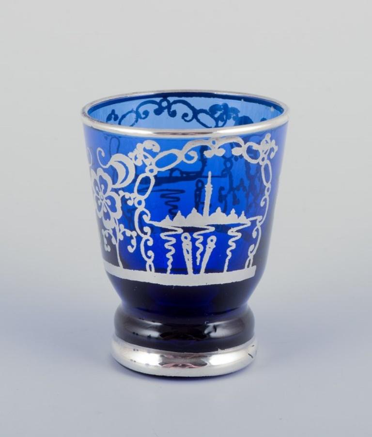 Venice, Italy. Liqueur set in blue glass: decanter and five cups. Mid-20th C. 1