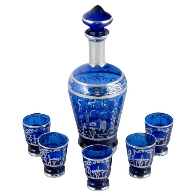 Venice, Italy. Liqueur set in blue glass: decanter and five cups. Mid-20th C.