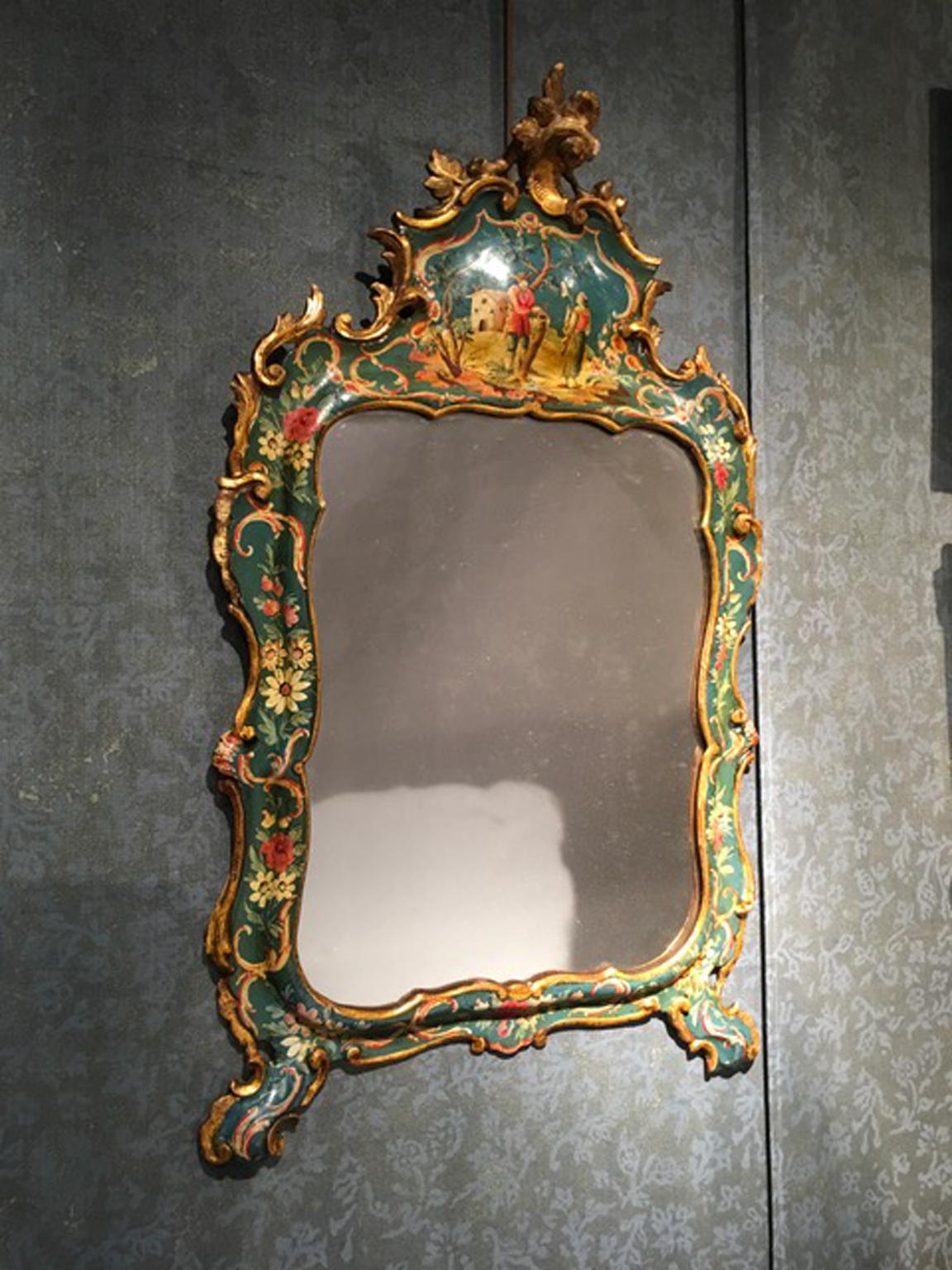 This is a very fine baroque handmade wooden mirror, with the original mercury glass. The wooden frame is hand painted with country life drawings on green, with a golden edge.

A very decorative piece and a collectibles one.

Original in every