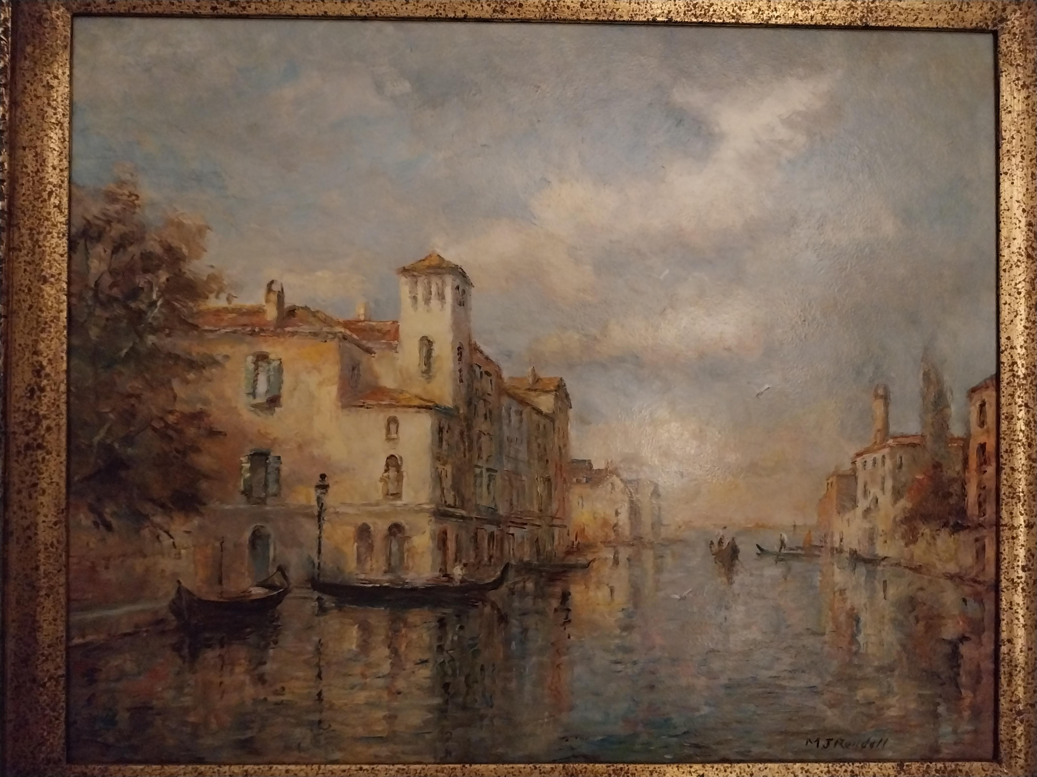 Un fabuloso Óleo sobre tabla Escena del canal veneciano con las nubes y los edificios reflejados en el agua resplandeciente.
M.J. Rendell, un artista impresionista muy consumado.
Venecia Circa mediados del siglo XX.
Presentado en un Marco Dorado