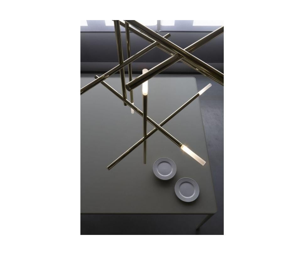 Floor sample sale item

Venicem Kitami suspension designed by: Massimo Tonetto

The Kitami Suspension Light is an exciting design of lighting engineering and craftsmanship. The pendant hangs like a series of conductor batons that are music to