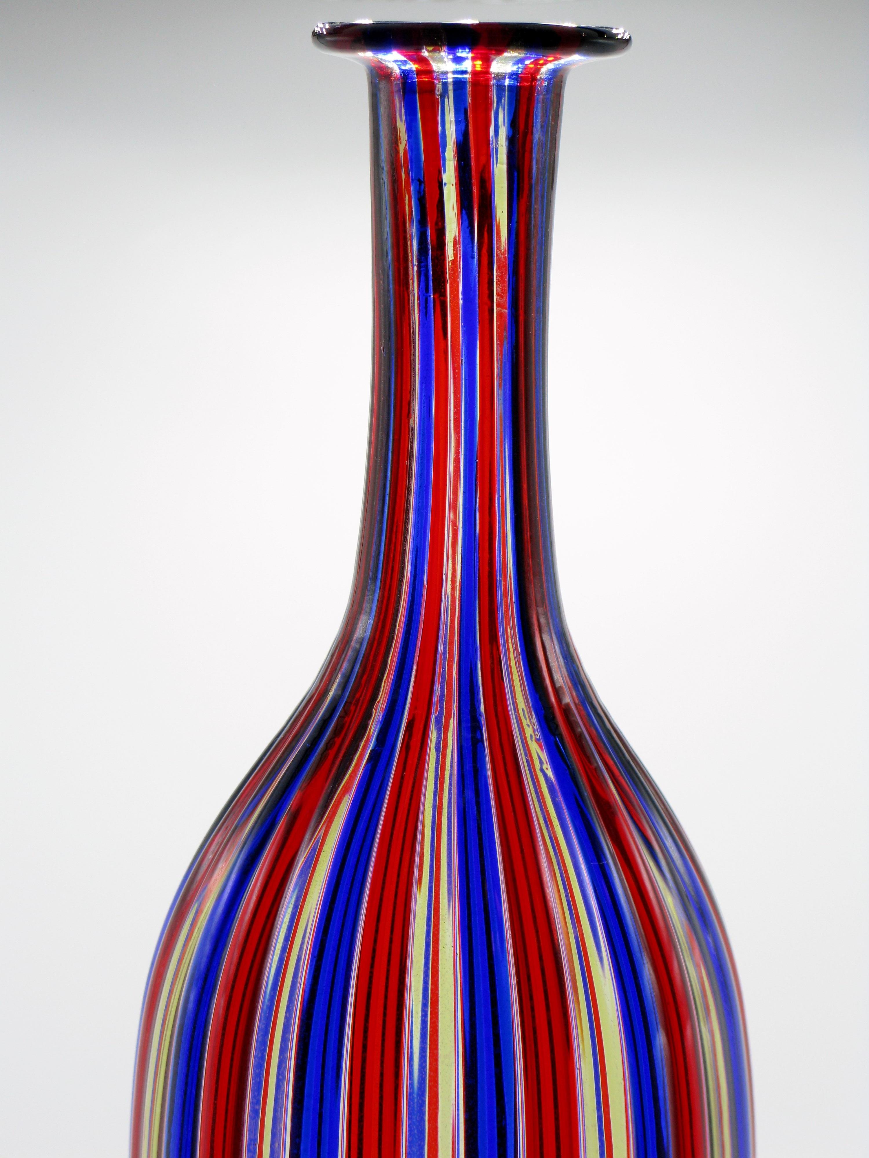 Gorgeous red, blue and clear glass striped 