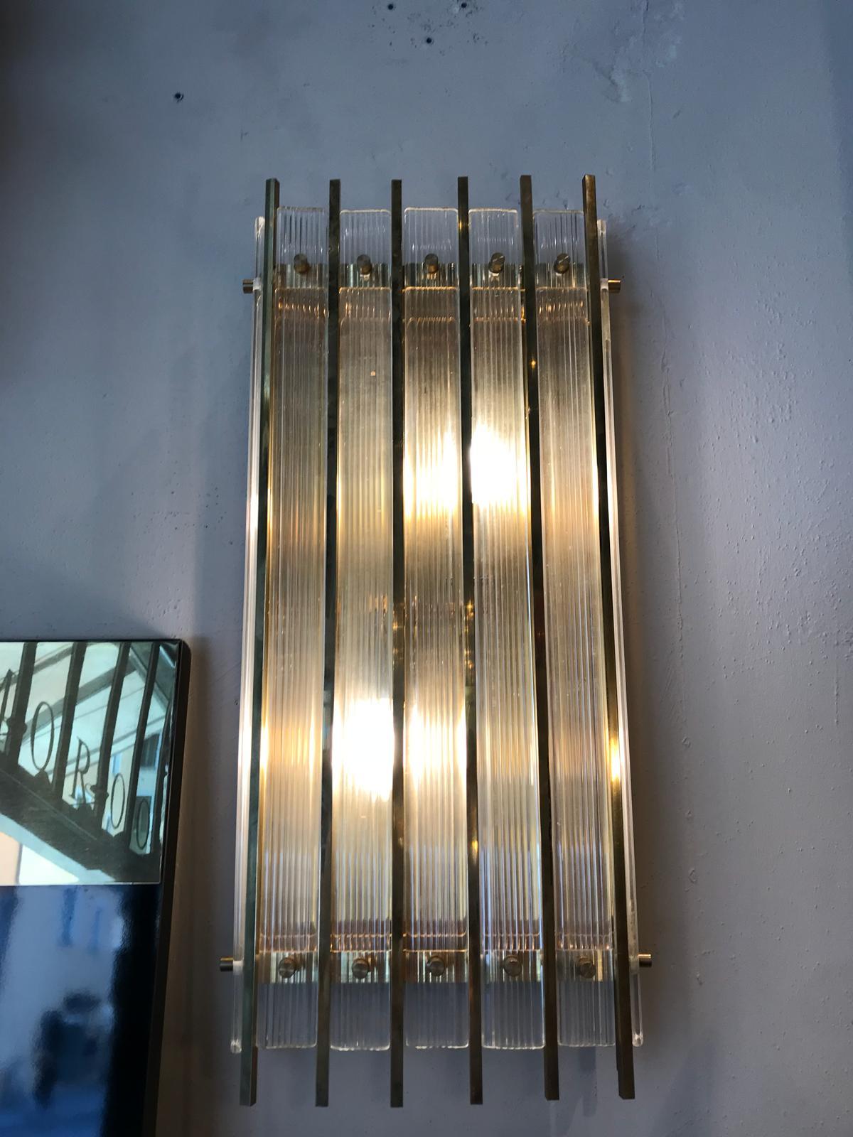 Applique, wall light, made by the famous Murano furnace Venini.
Made in Italy in the 1980s
Murano glass and nickel bars.
 
