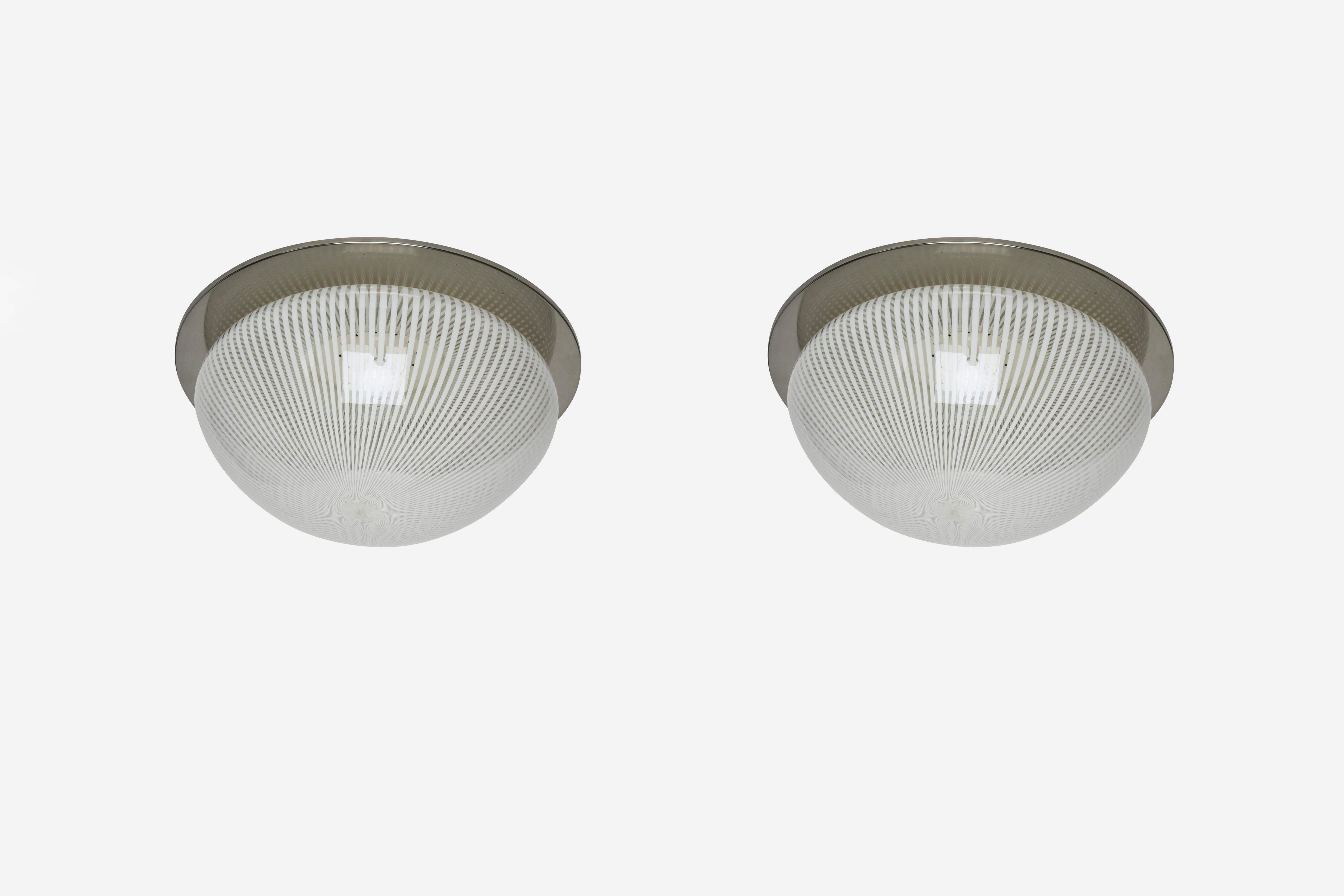 Venini attributed Murano glass flush mount ceiling light
Murano reticello glass, chrome plated metal.
Made in Italy in 1960s.
Diameter of the glass only is 15 inches.
Take one Edison bulb each
Complimentary US rewiring upon request.
2 lights are