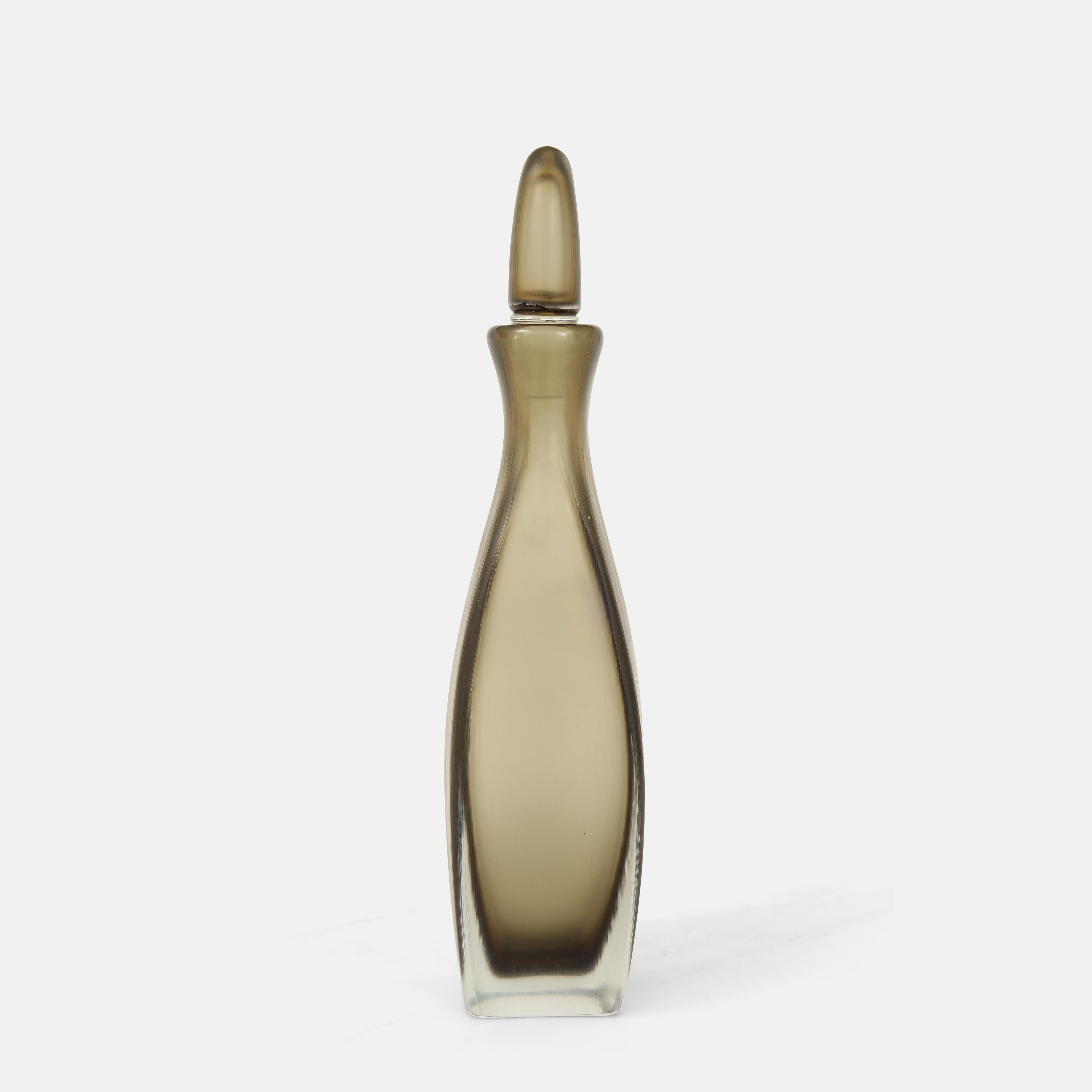 Venini glass bottle with stopper in composite glass with finely wheel-engraved finish of delicate creases, incised on bottom 