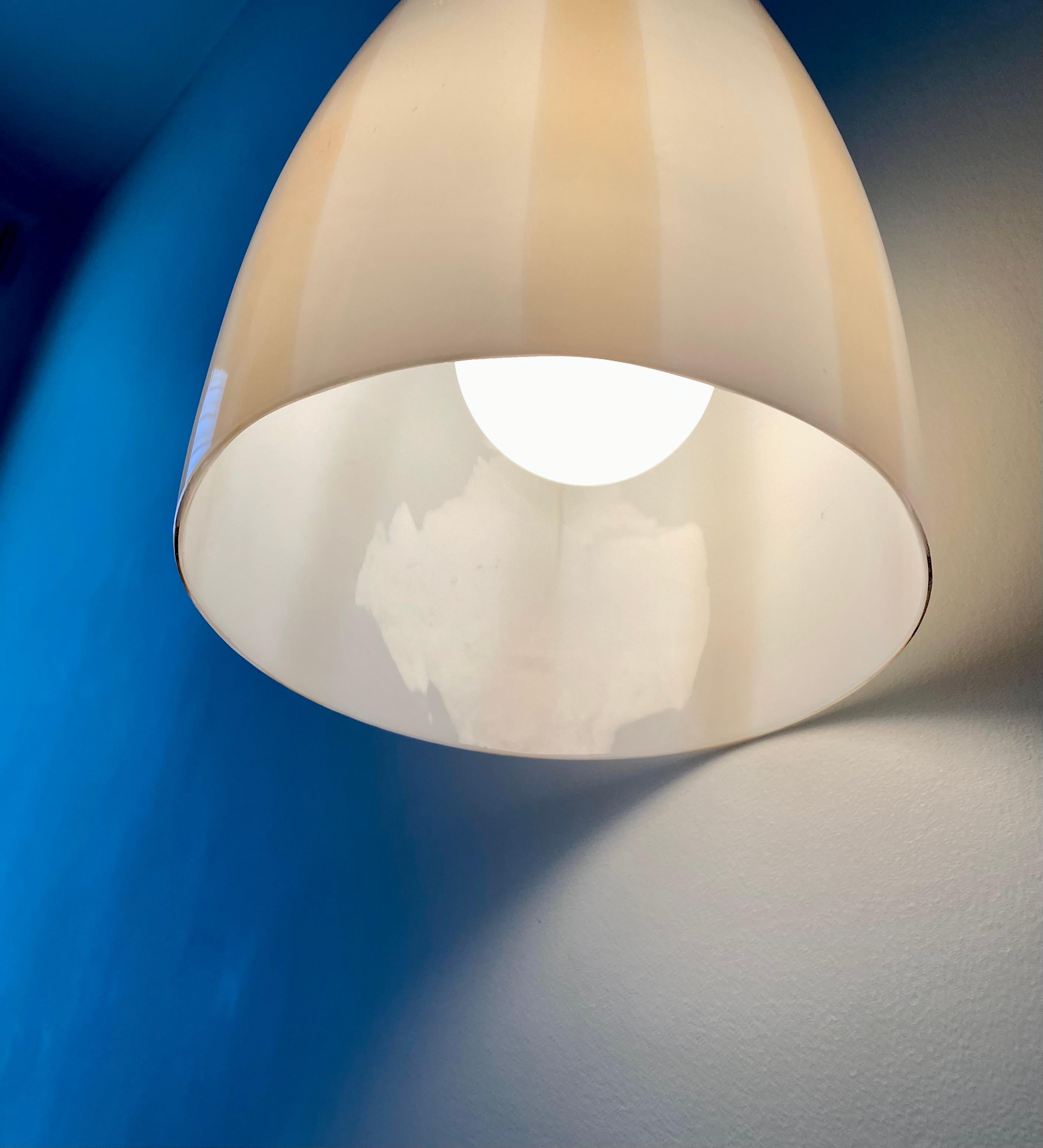 Fasce Verticale ceiling lamp, model #4038 Venini Cataogue, c. 1955.
 Beige on white. This pendant works well as a single or could be paired with other Vignelli  for Venini pendants we have in inventory. 

Additional information:
Materials: