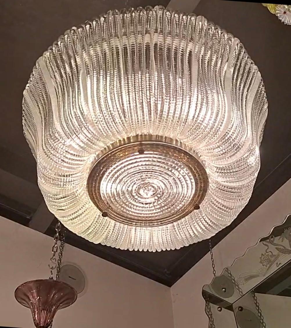 ECCEZIONALE LAMPADARIO VENINI DEL 1940 IN VETRO DI MURANO STRUTTURA IN FERRO E OTTONE PUBBLICATO SUI LIBRI DELLA VENINI IN OTTIMO STATO...PROVENIENTE DA UNA VILLA IN SARDEGNA.....    anno di produzione 1940.