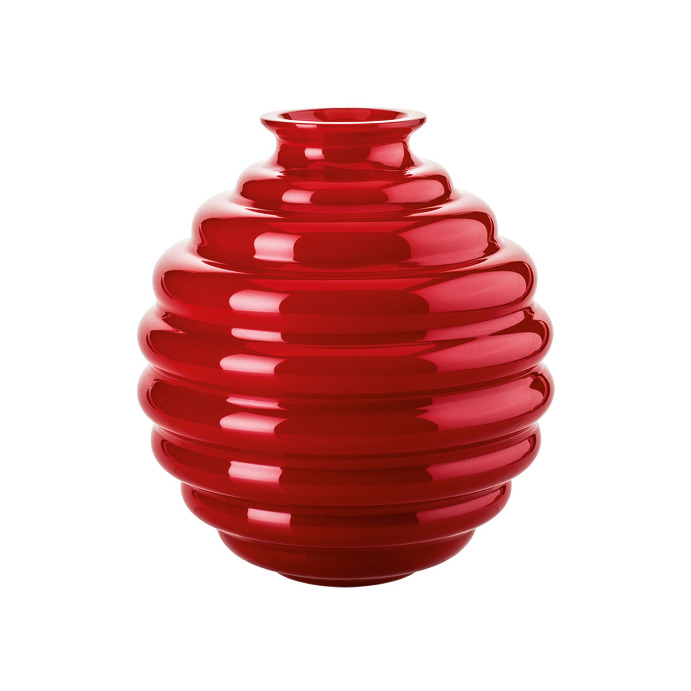 Venini glass vase in red designed by Napoleone Martinuzzi in 1930. Perfect for indoor home decor as container or statement piece for any room. Also available in other colors on 1stdibs.

Dimensions: 26 cm diameter x 29 cm height.