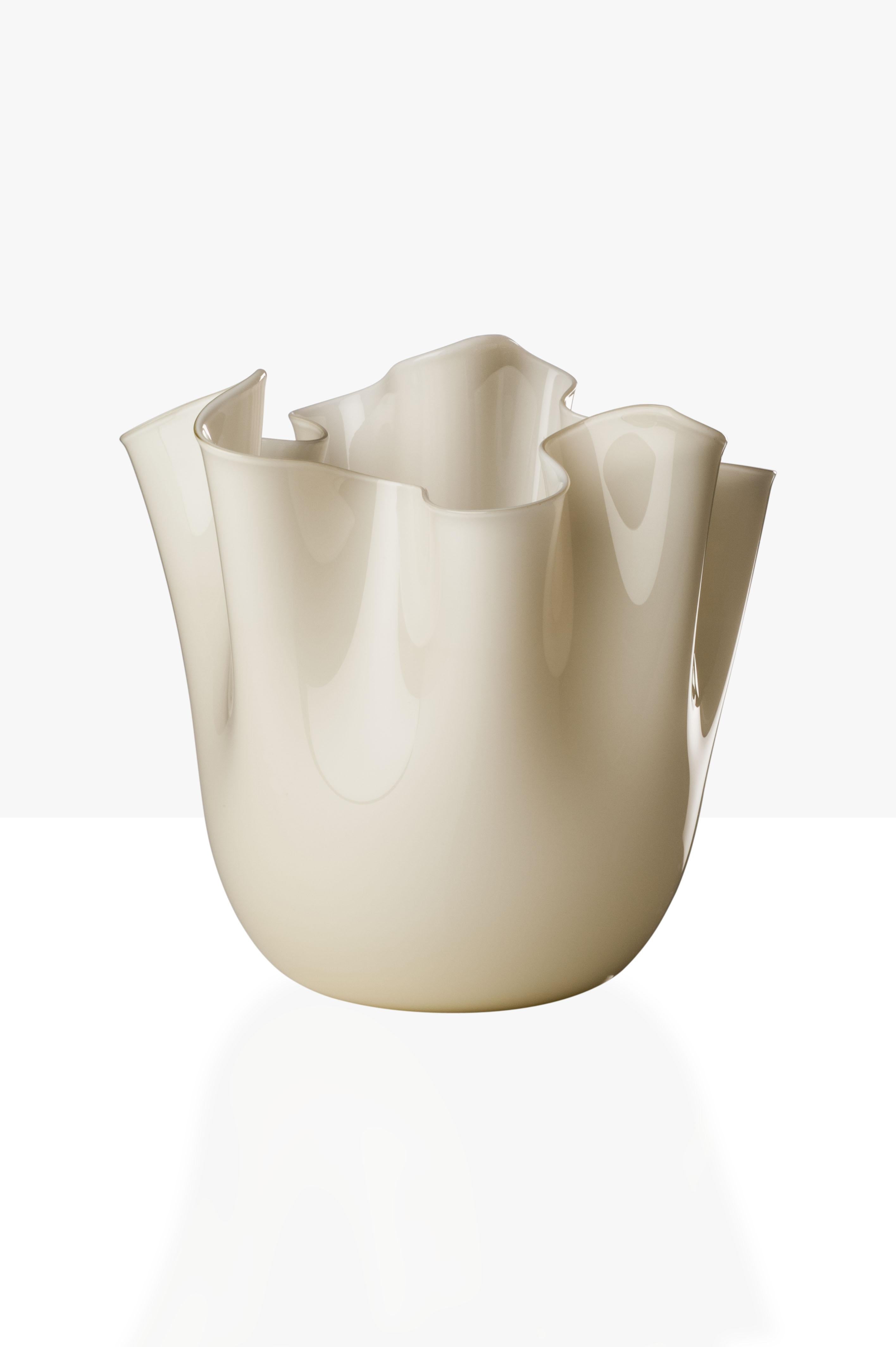 Fazzoletto glass vase, designed by Fulvio Bianconi and Paolo Venini and manufactured by Venini, is available in three different sizes. Original designed in 1948. Indoor use only.

Dimensions: Ø 23 cm, H 31 cm.