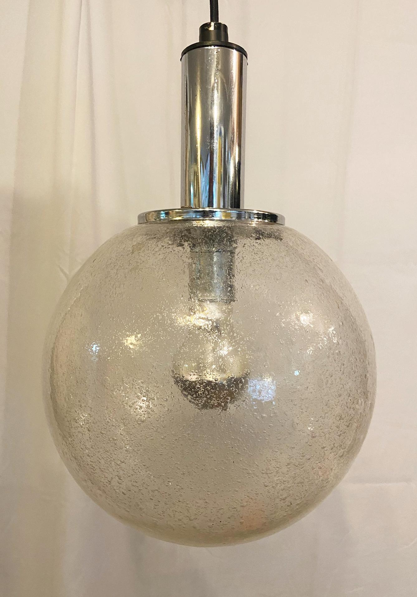 Chandelier with spherical lampshade in transparent Murano blown glass with 
