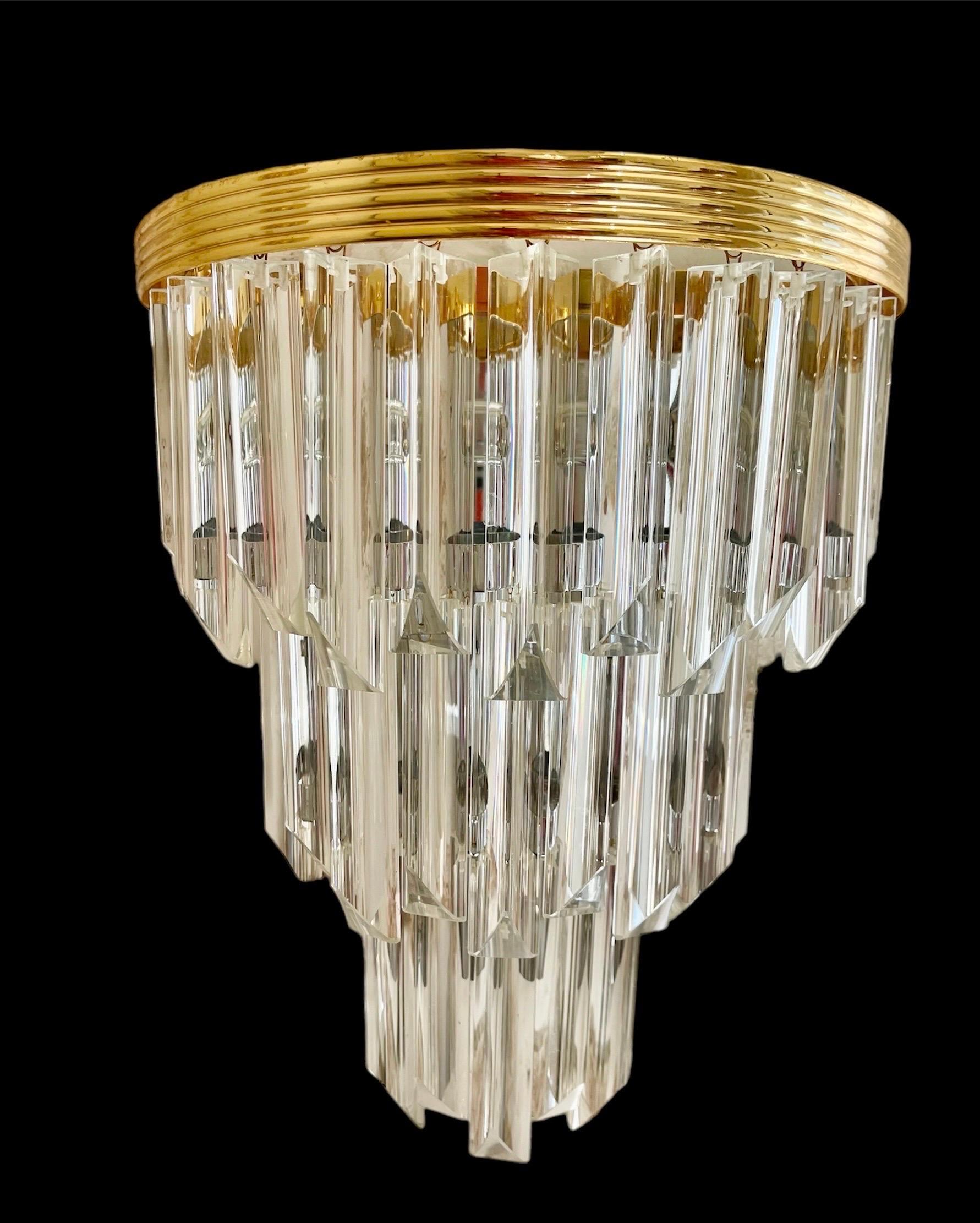 Venini wall lighting murano glass with in iridium glass. The design and the quality of the glass make this piece the best of the design.
This wall lighting pair are in good condition.

Venini is an Italian company that is known for its high-quality,