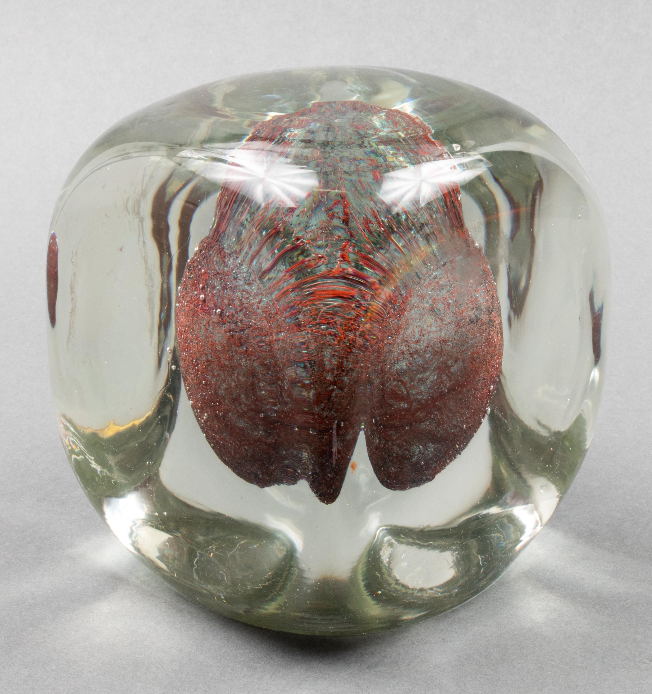 Venini Italian Modern clear art glass sculpture, of squircle cube outline and internally decorated with a red ovoid-form orb, the base inscribed 