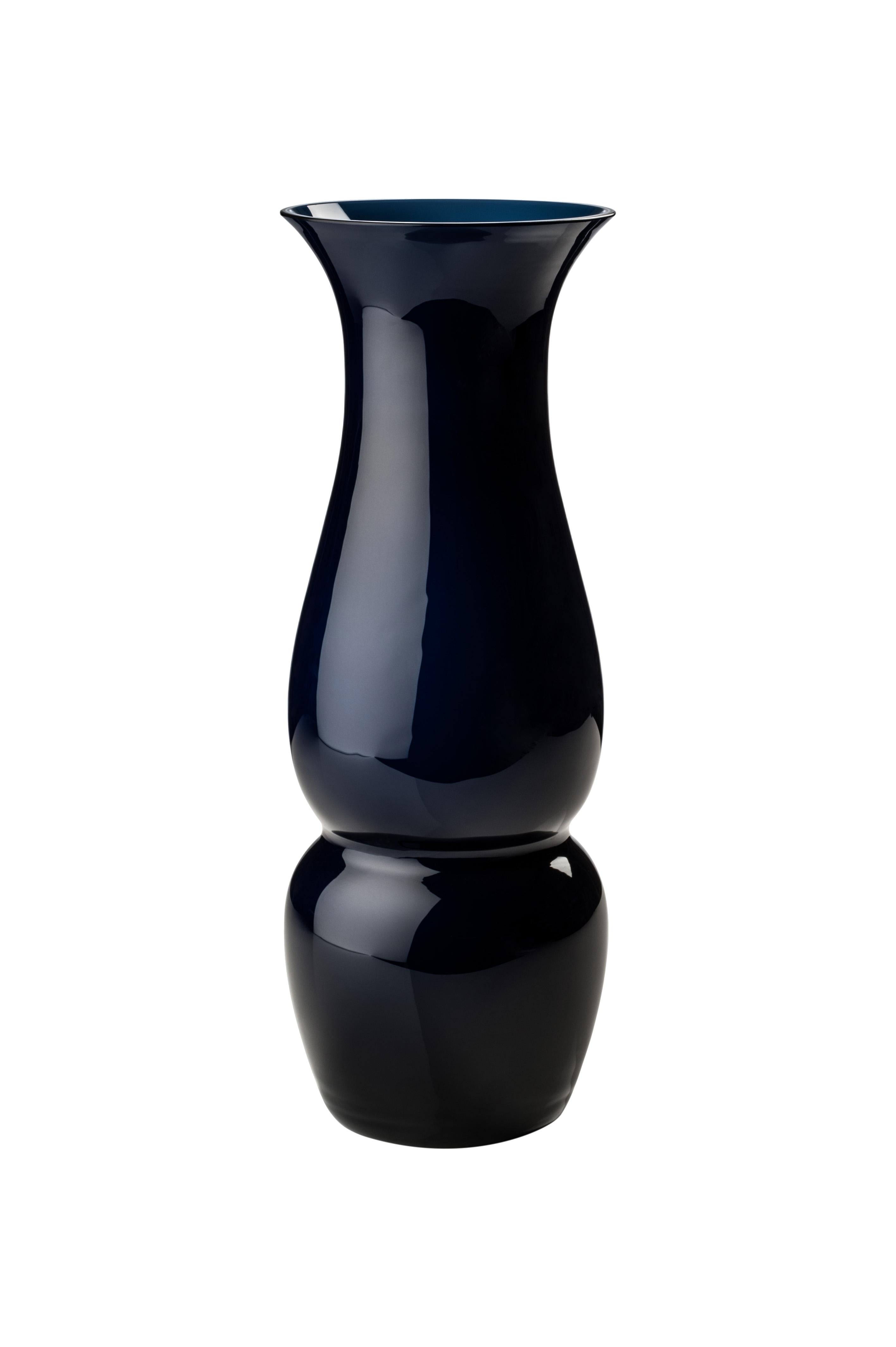 Venini glass vase with elongated body and funnel shaped neck in marine blue designed by Leonardo Lanucci in 2016. Perfect for indoor home decor as container or strong statement piece for any room. Also available in other colors on