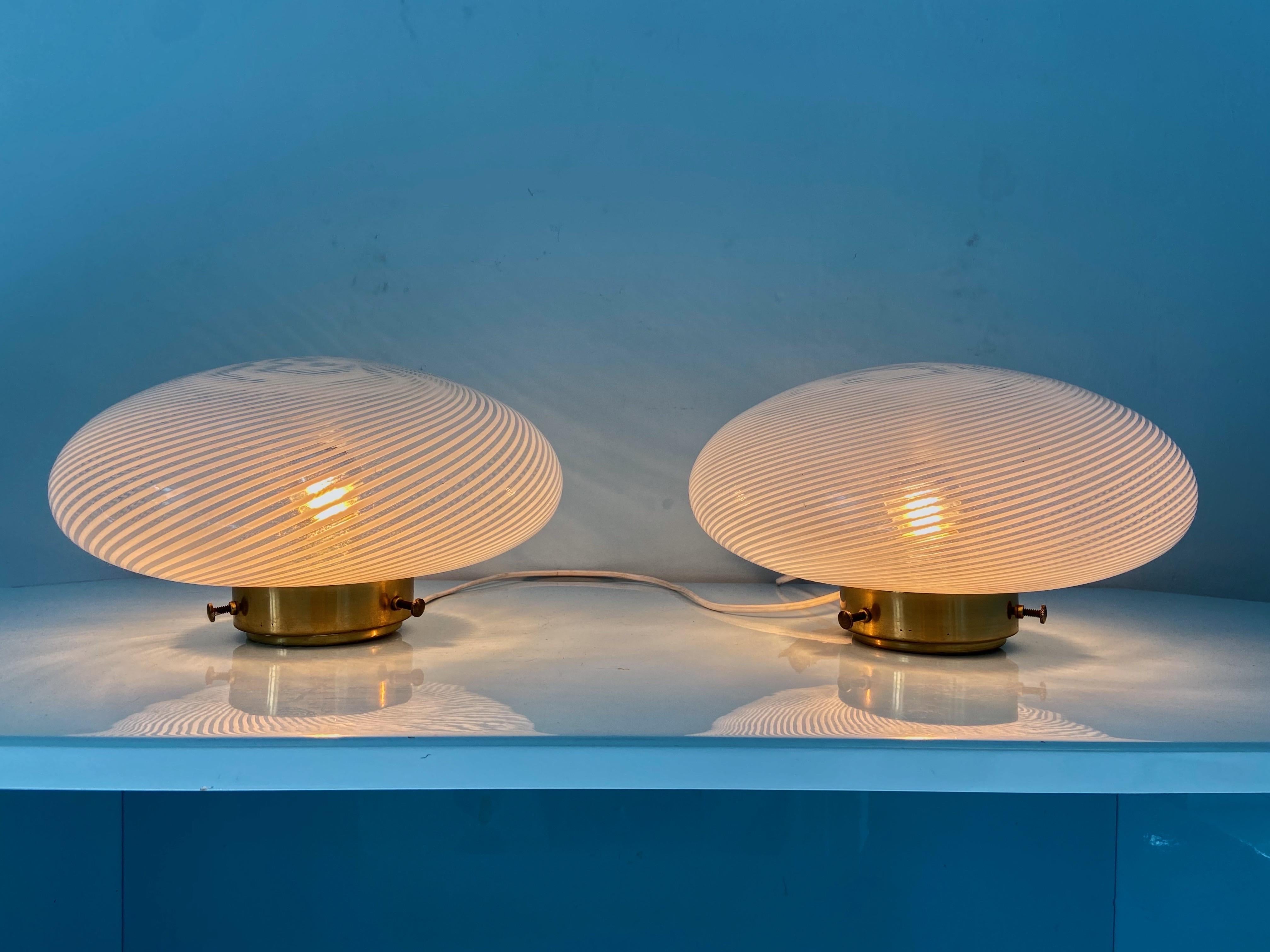 Elegant set of 2 wall sphere sconces by Ludovico Diaz de Santillana for Venini, Series -Tessuto-, Italy, 1970s. The Murano glasses are set on a brass frame. Very good condition, the glass is perfect. Sold as pair. 
Details

Creator: Ludovico Diaz