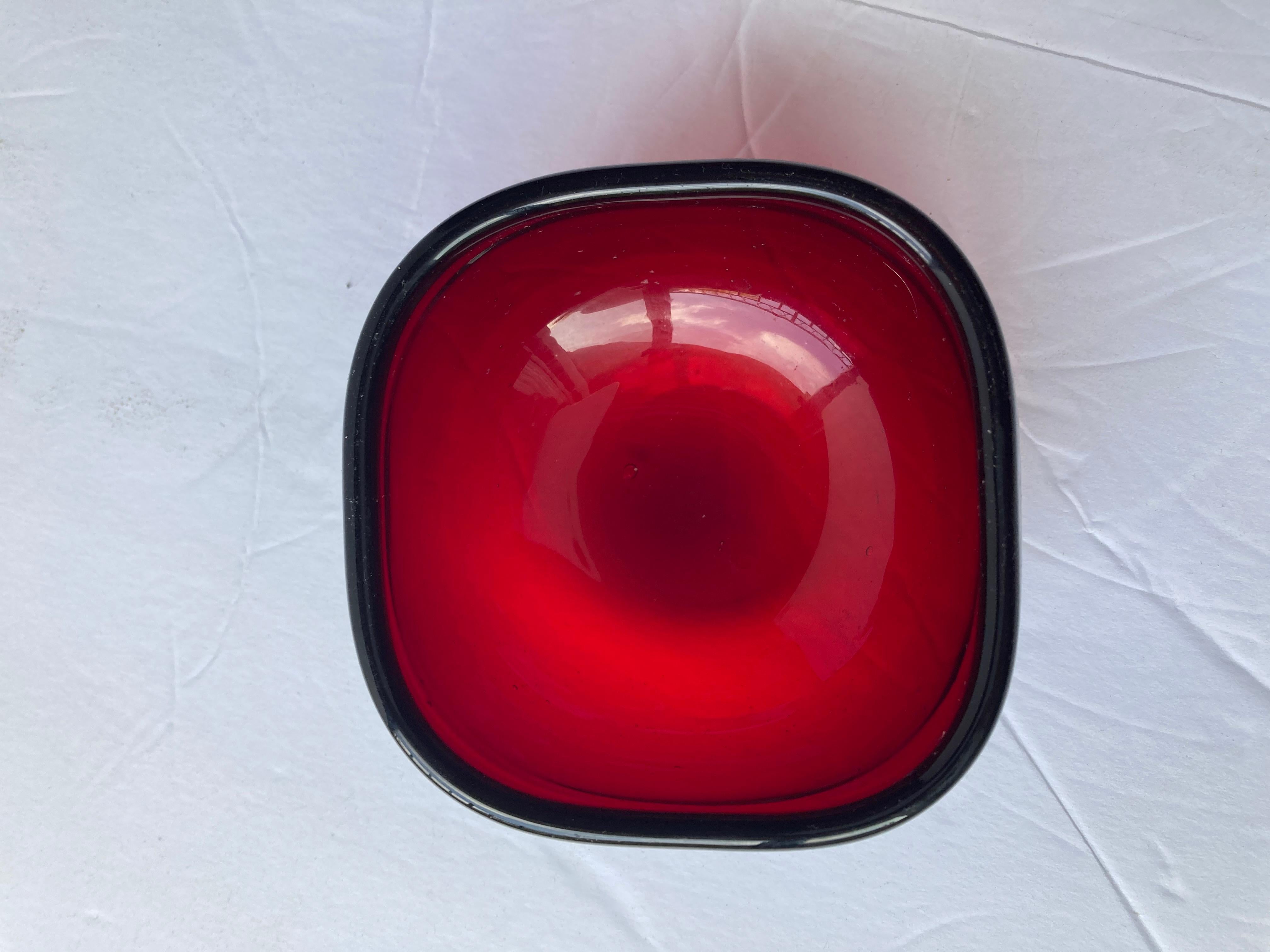 Beautiful small bowl in ruby red glass by Venini. Signed in acid 3 lines, several designers worked at the studio at same time in the 40-70