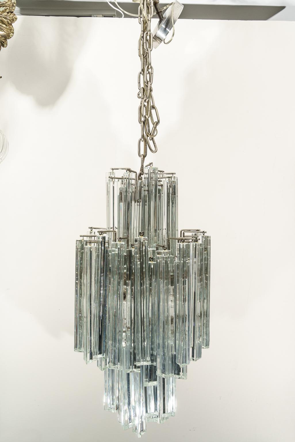 Vintage Venini chandelier for Camer Glass Clear Triangle Prisms from a Palm Beach estate

Note: Dimension not including the chain are 27