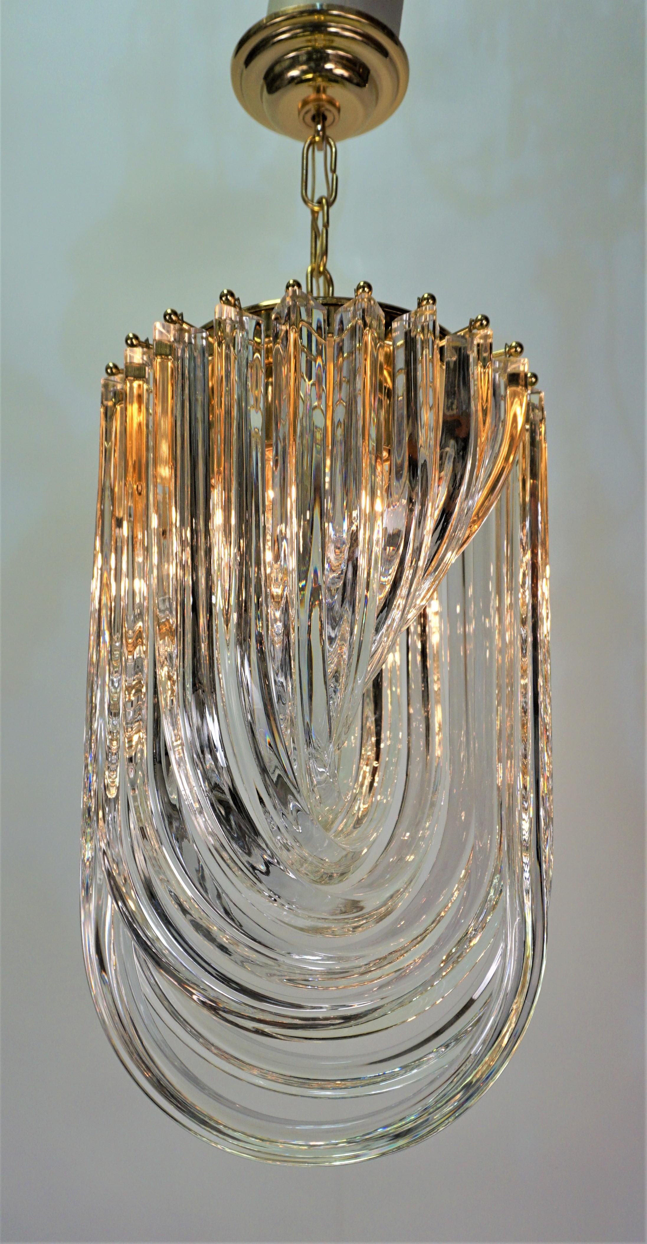 Extra fine quality eleven U shape Murano glass with gold plated hardware chandelier by Carlo Nason.