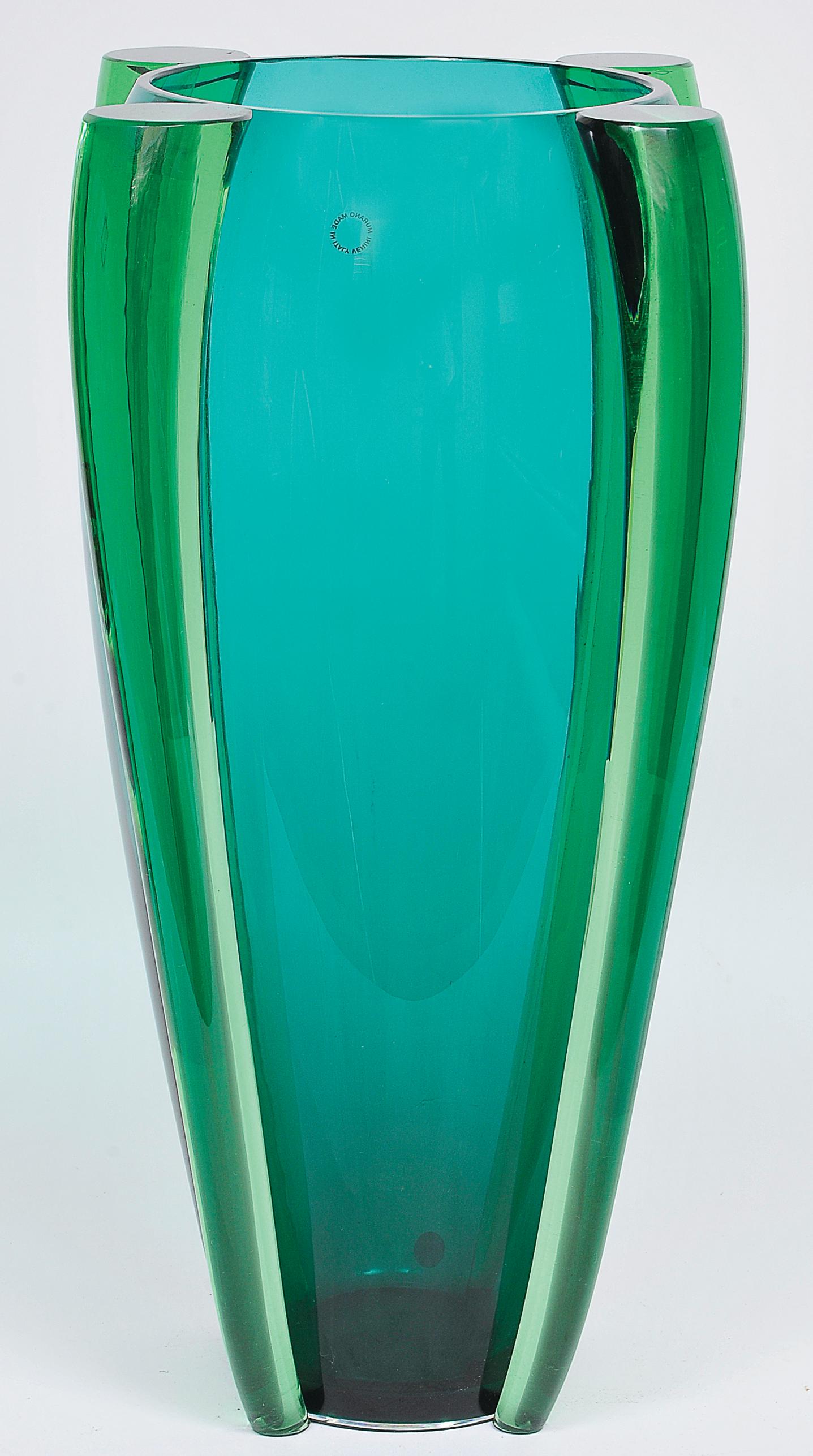 Incredible tall vase by Venini in strong emerald green with four applied parts of glass along the body of the vase.