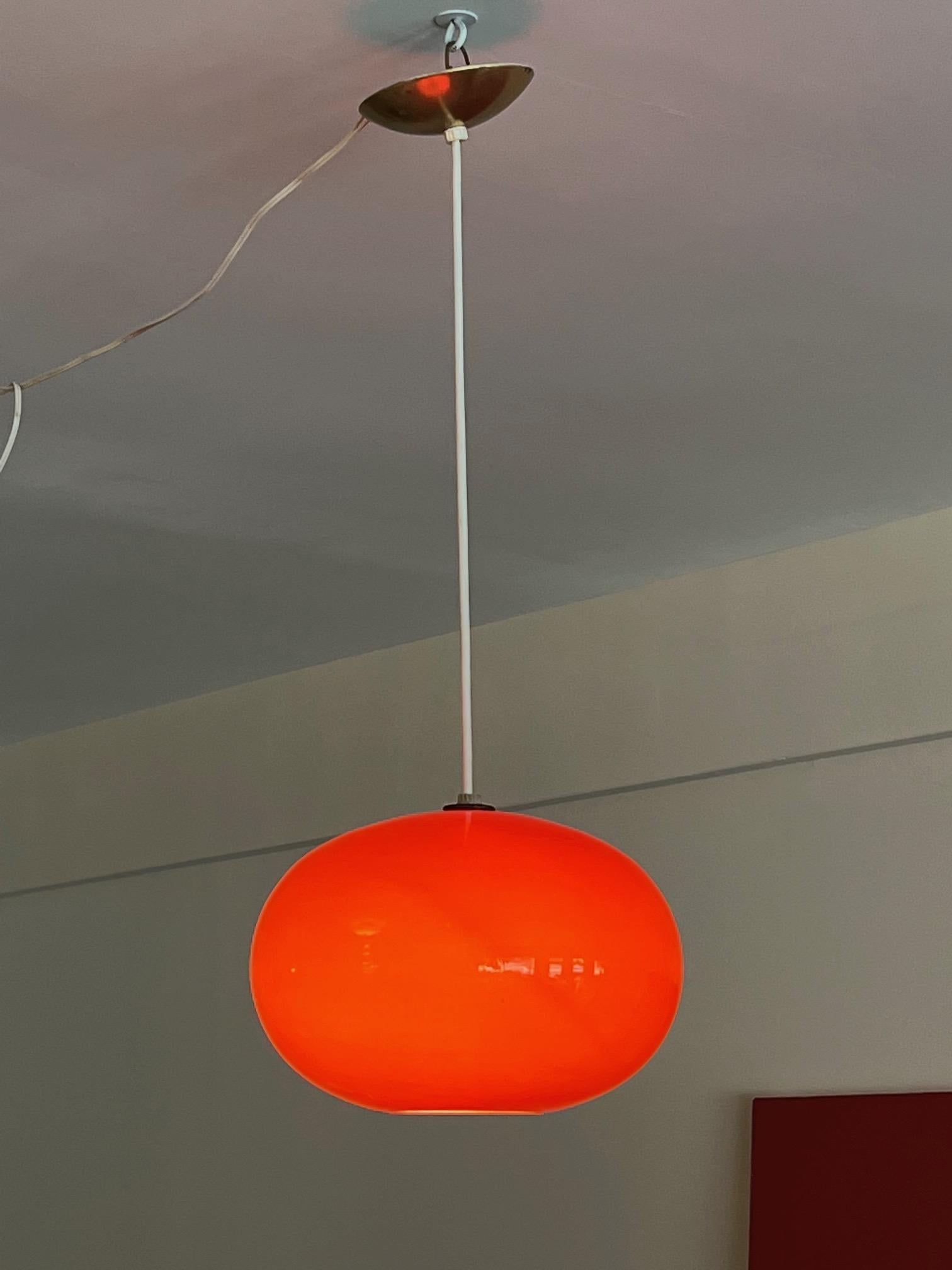 Classic Venini Murano dark orange and white, cased glass pendant chandelier. Very elegant UFO-