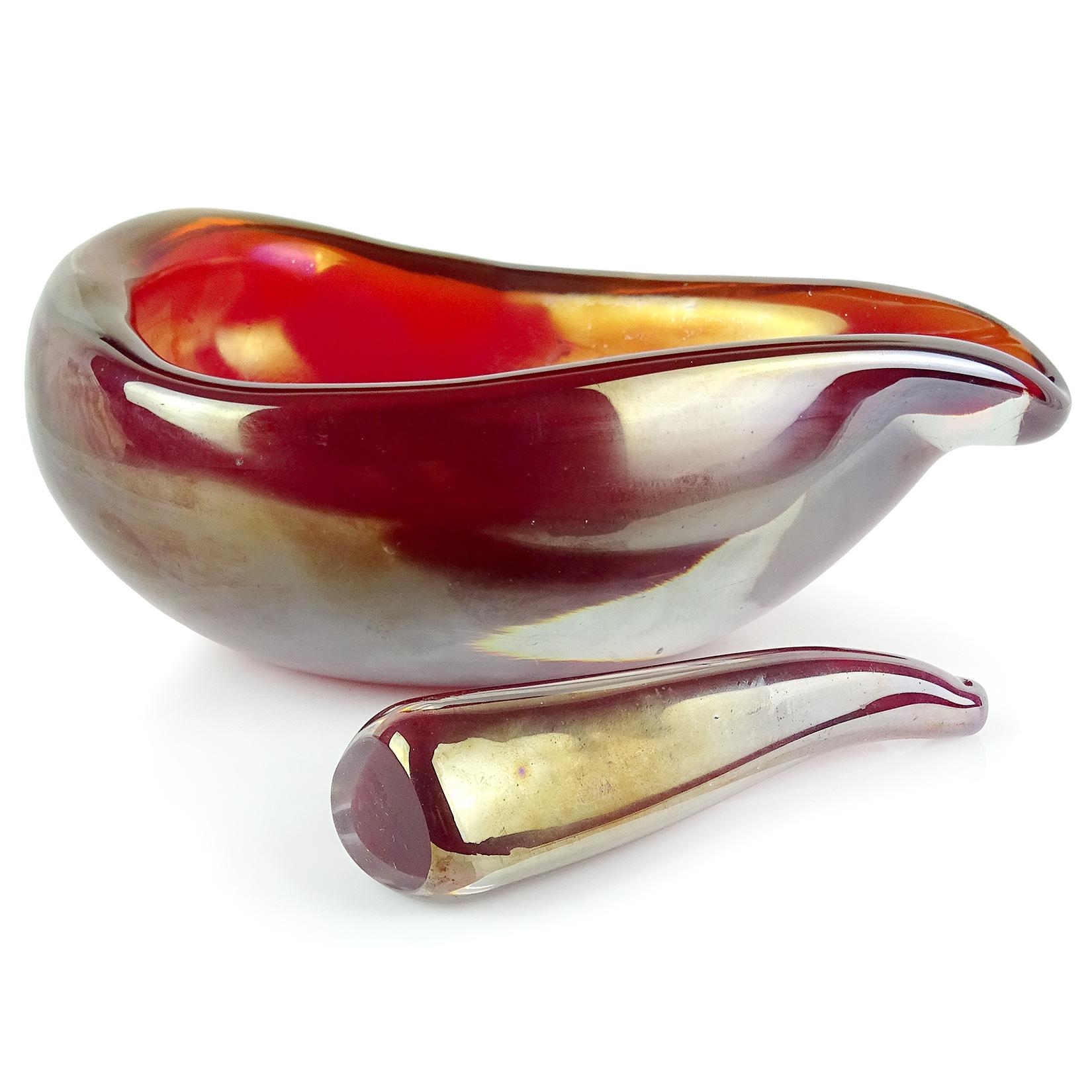 Beautiful Murano hand blown Sommerso red and heavy iridescent surface Italian art glass bowl, with matching pestle. Documented the Venini company, with both pieces fully signed 
