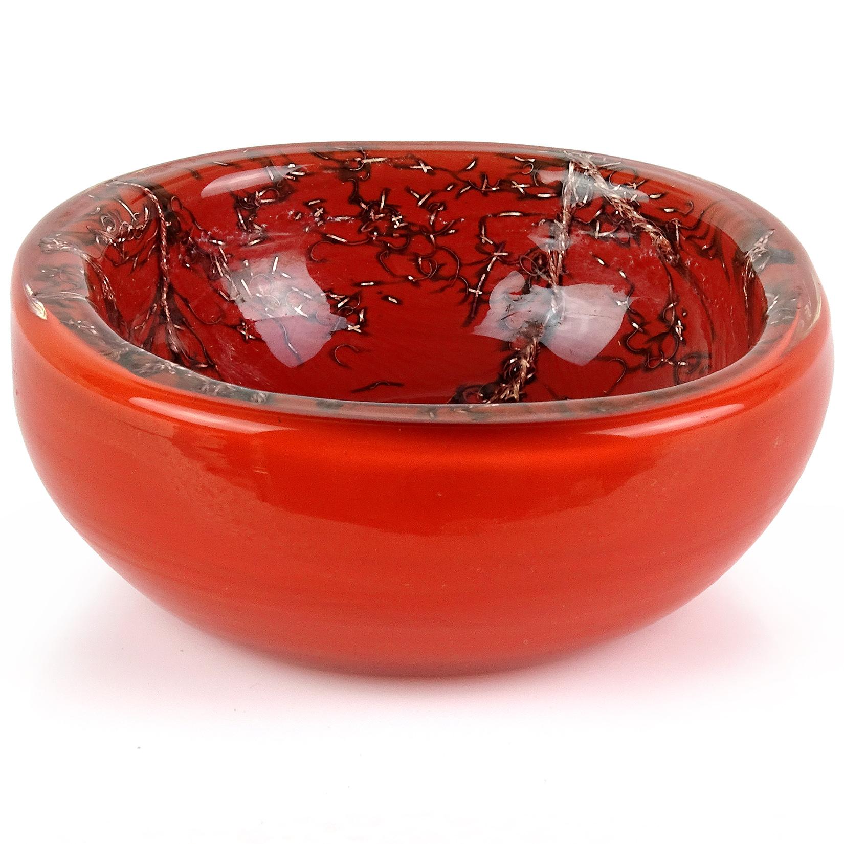 Beautiful and rare vintage Murano hand blown coral red orange with copper filaments Italian art glass bowl / ring dish. Documented to designer Toni Zuccheri for Venini, circa 1964 from the 
