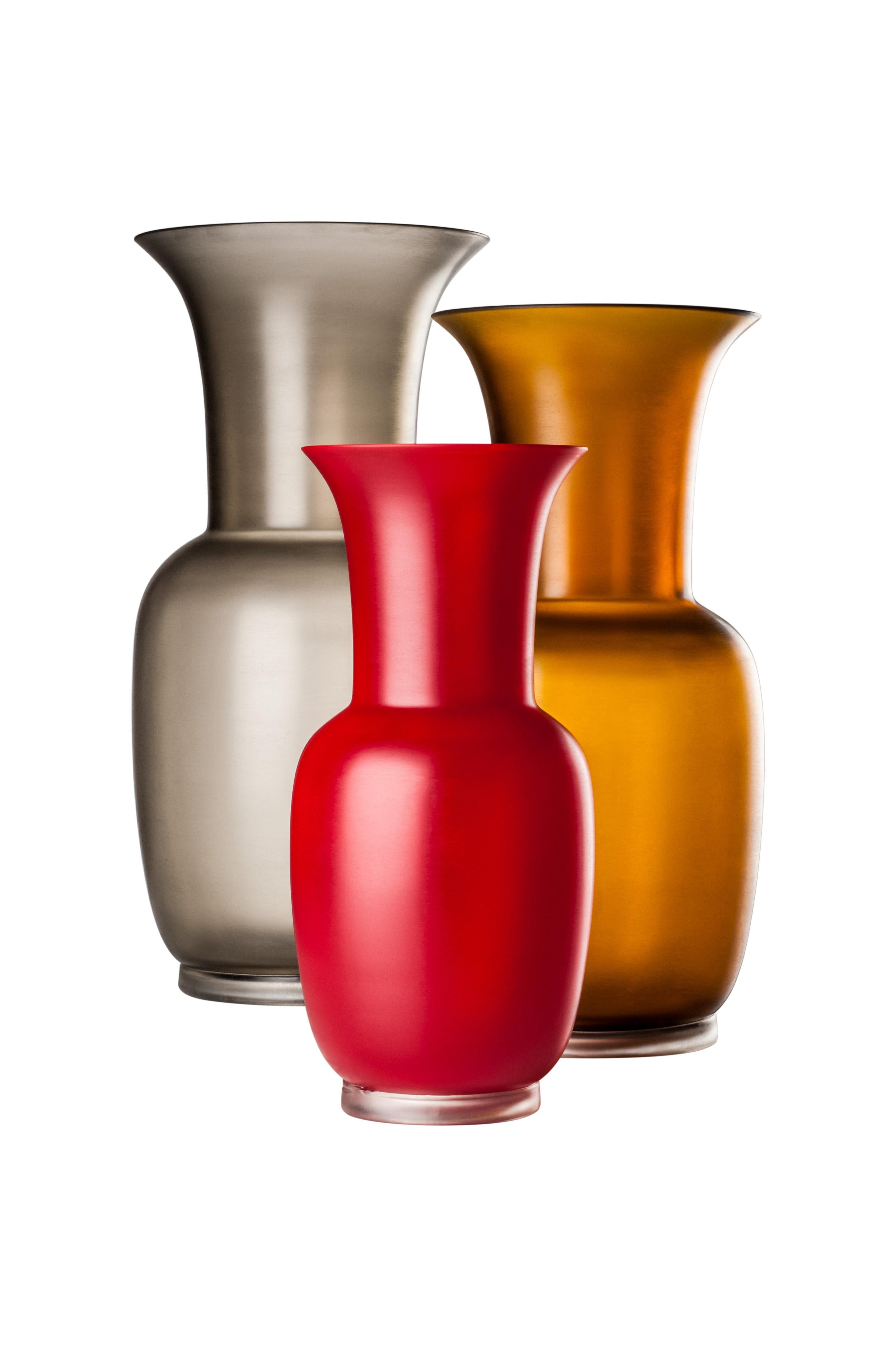 Satin glass vase, designed and manufactured by Venini, features the same shape of the iconic opalino vase with a frosted finish.
Indoor use only.

Dimensions: Ø 20 cm, H 42 cm.
        
