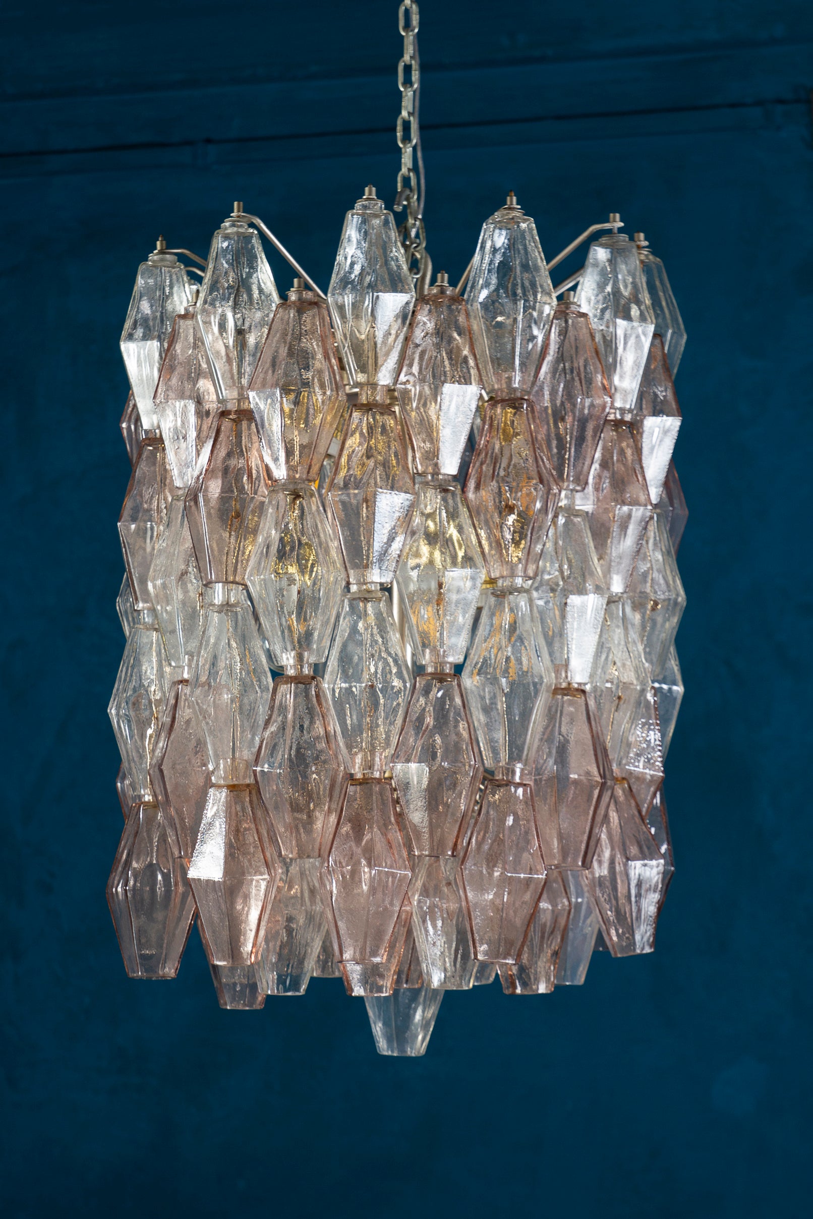 Fabulous original Venini Poliedri chandelier by Carlo Scarpa. Rare combination of light pink and Ice colored Murano glass.
Chrome frame in very good original condition.
 Available also a pair and a pair of sconces.
 