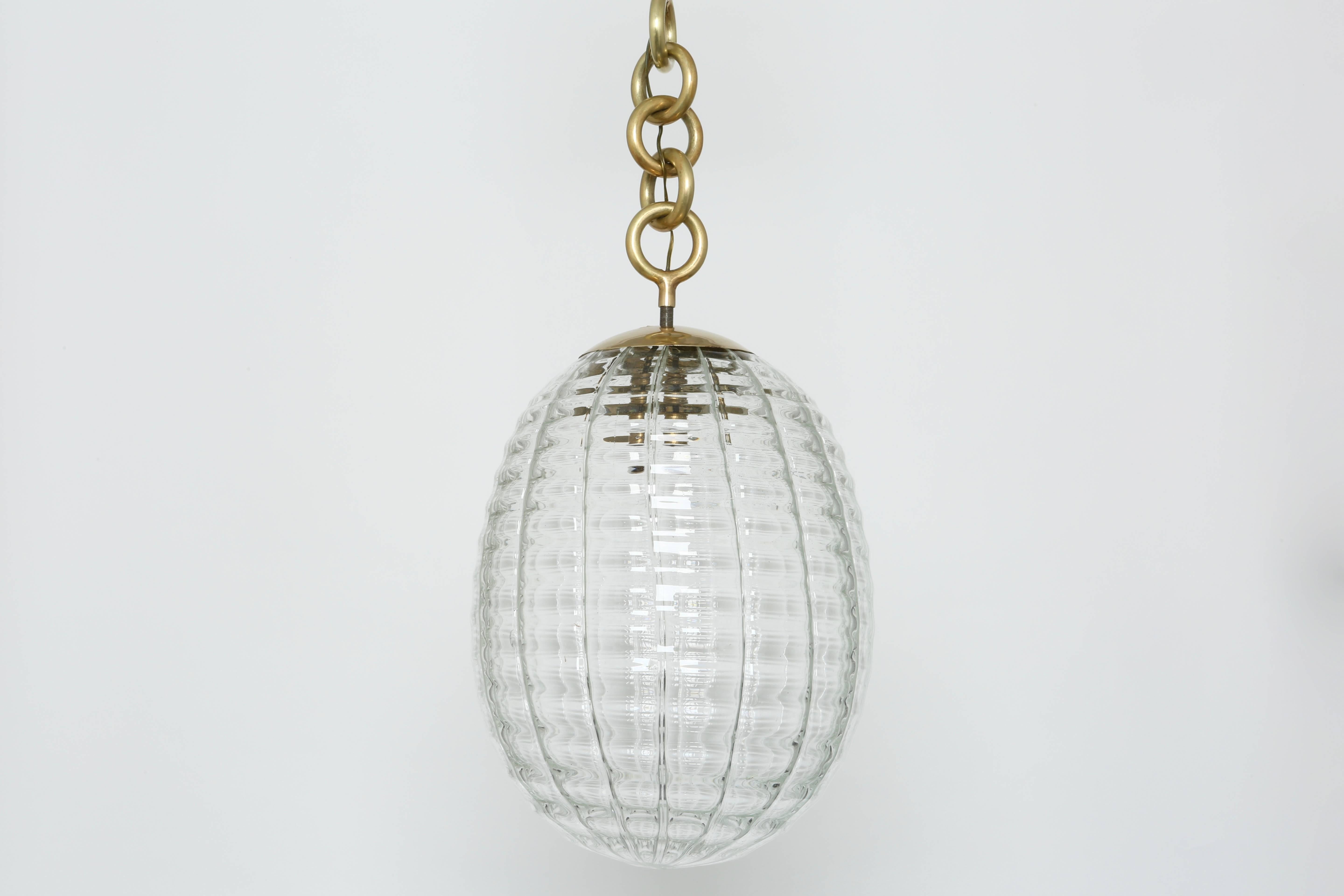 Venini ceiling pendant.
Made with hand blown glass and brass.
Italy, 1950s.
Two pendants available.