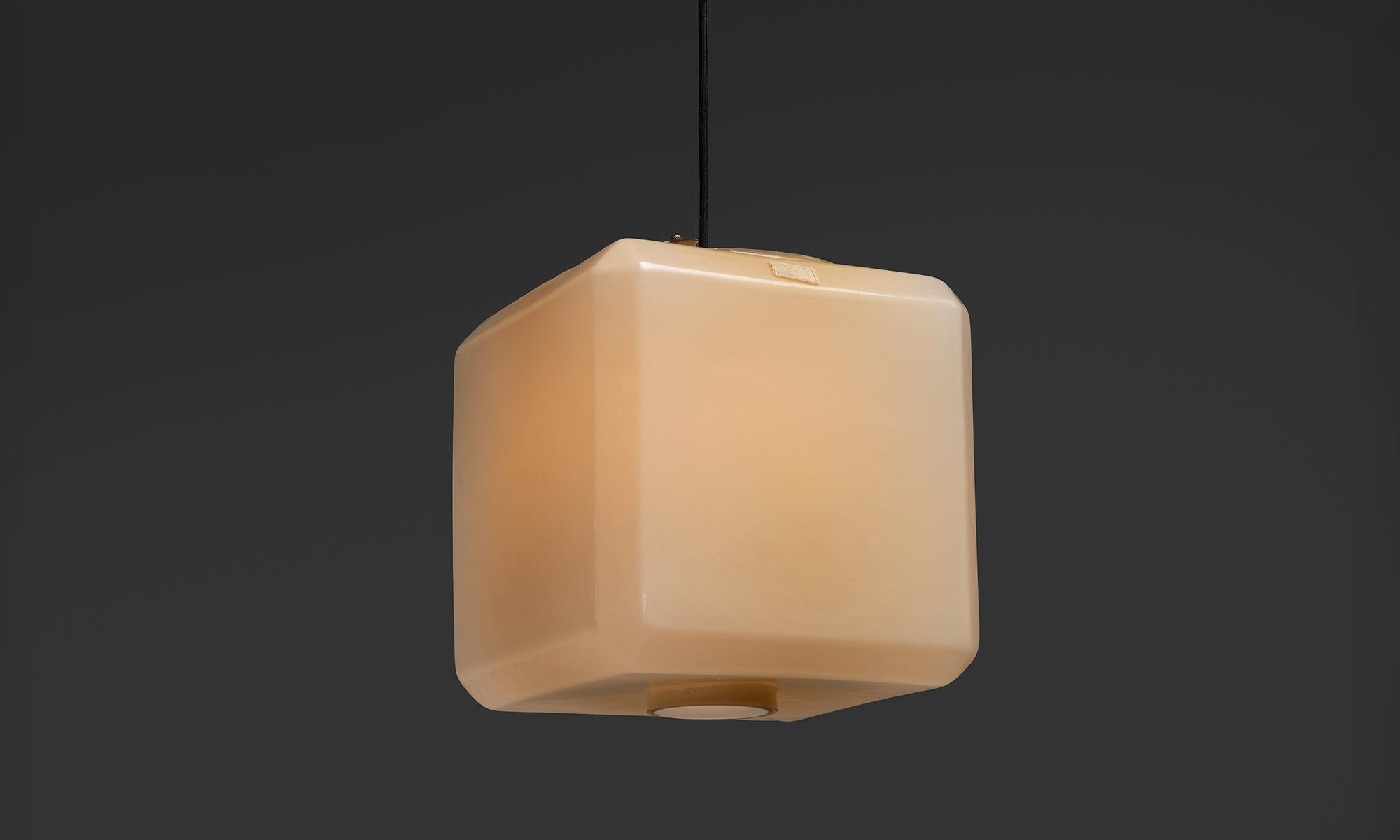 Italy, 1960
Thick cube shaped glass pendant with brass fitter.
13