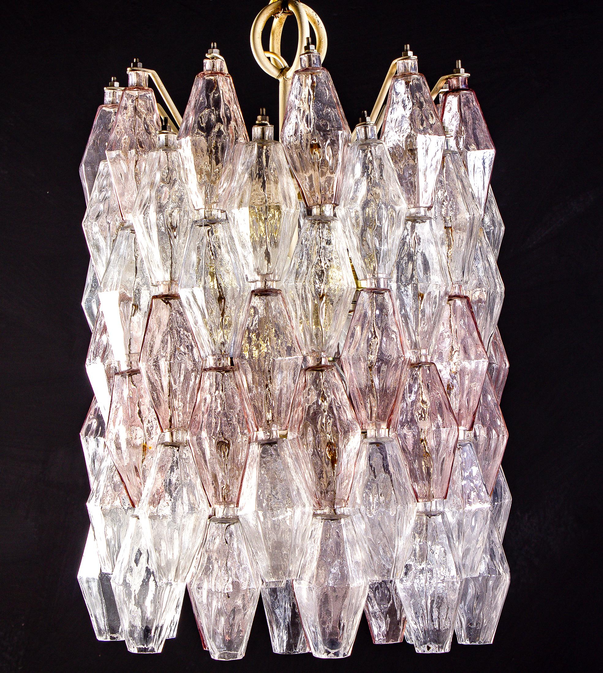 Fabulous original Venini Poliedri chandelier by Carlo Scarpa. Rare combination of light pink and Ice colored Murano glass.
Ivory painted frame in very good original condition.
 